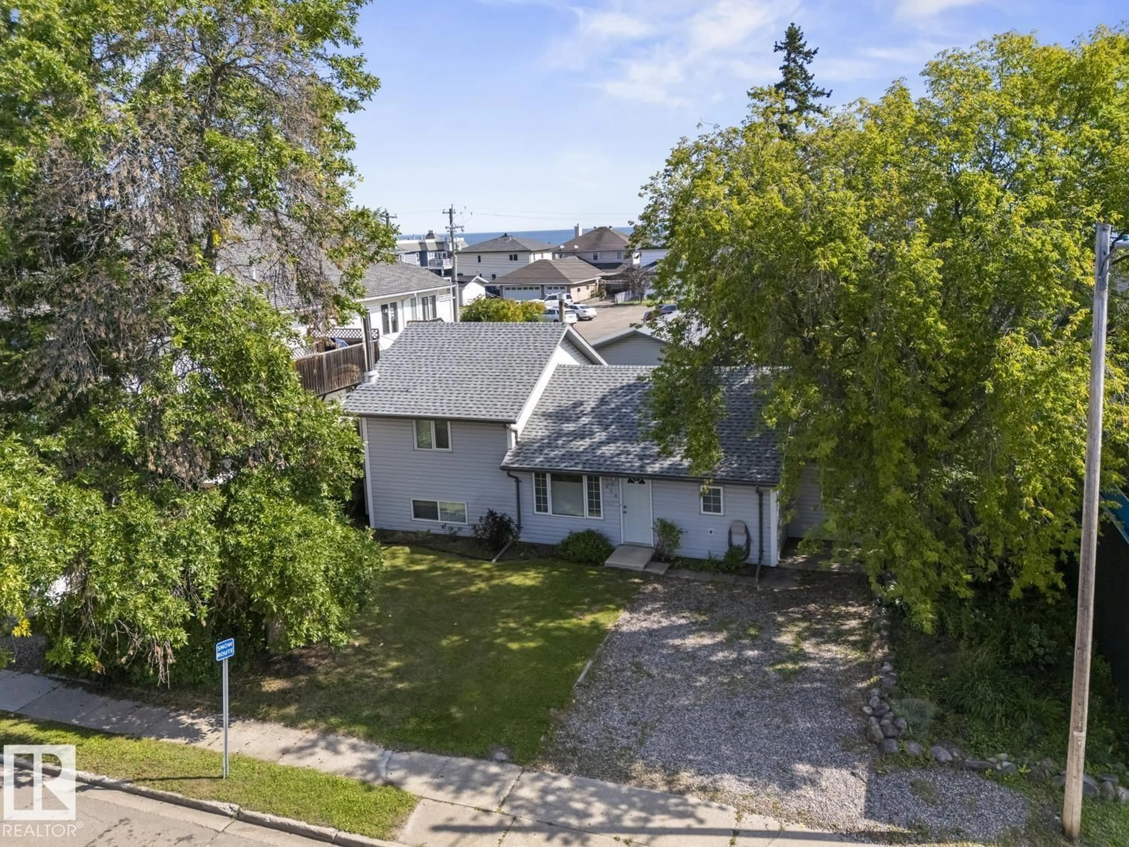 A pic from outside/outdoor area/front of a property/back of a property/a pic from drone, street for 618 10 ST, Cold Lake Alberta T9M1B1