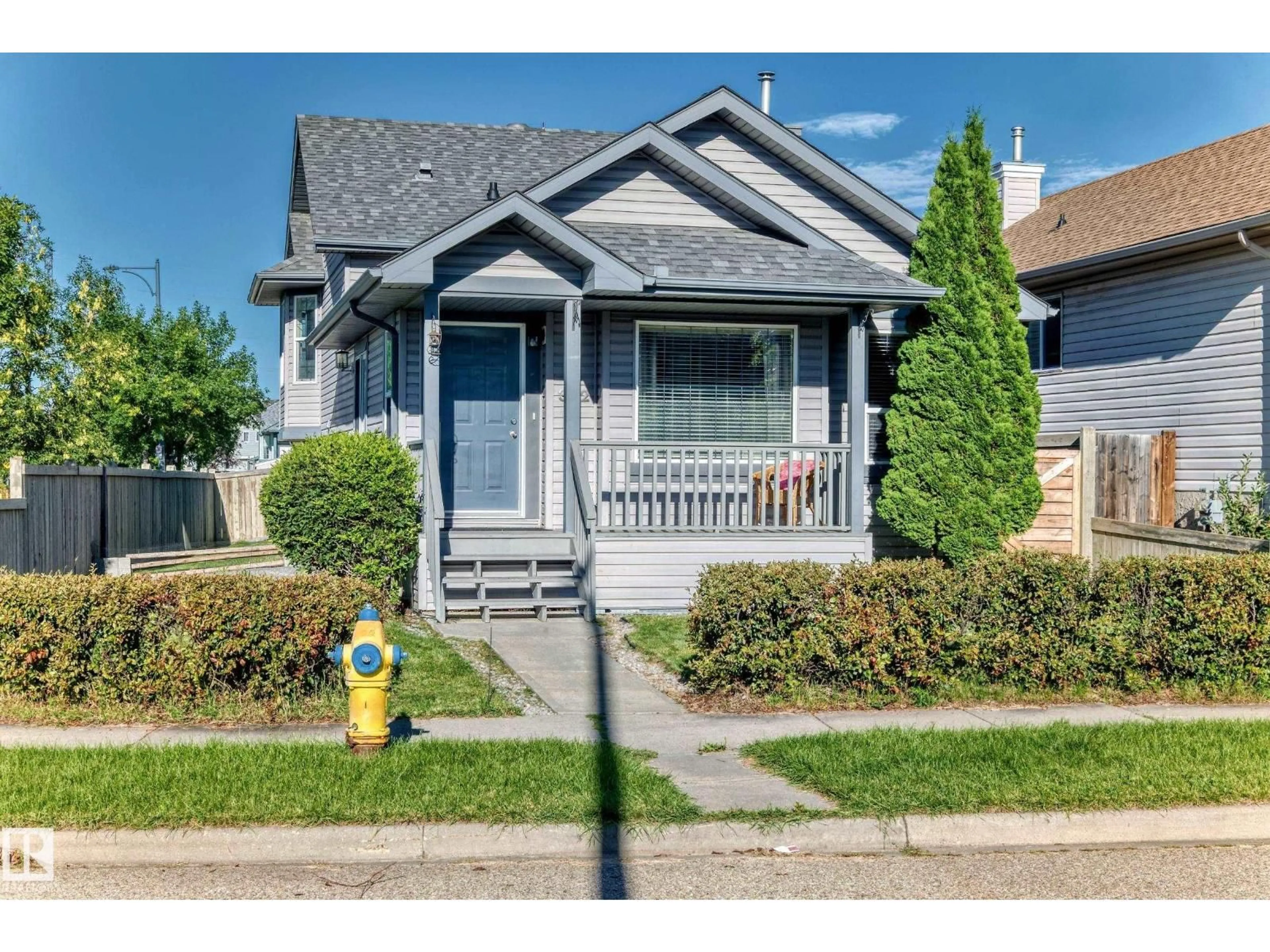 Home with vinyl exterior material, street for 322 84 ST, Edmonton Alberta T6X1H8