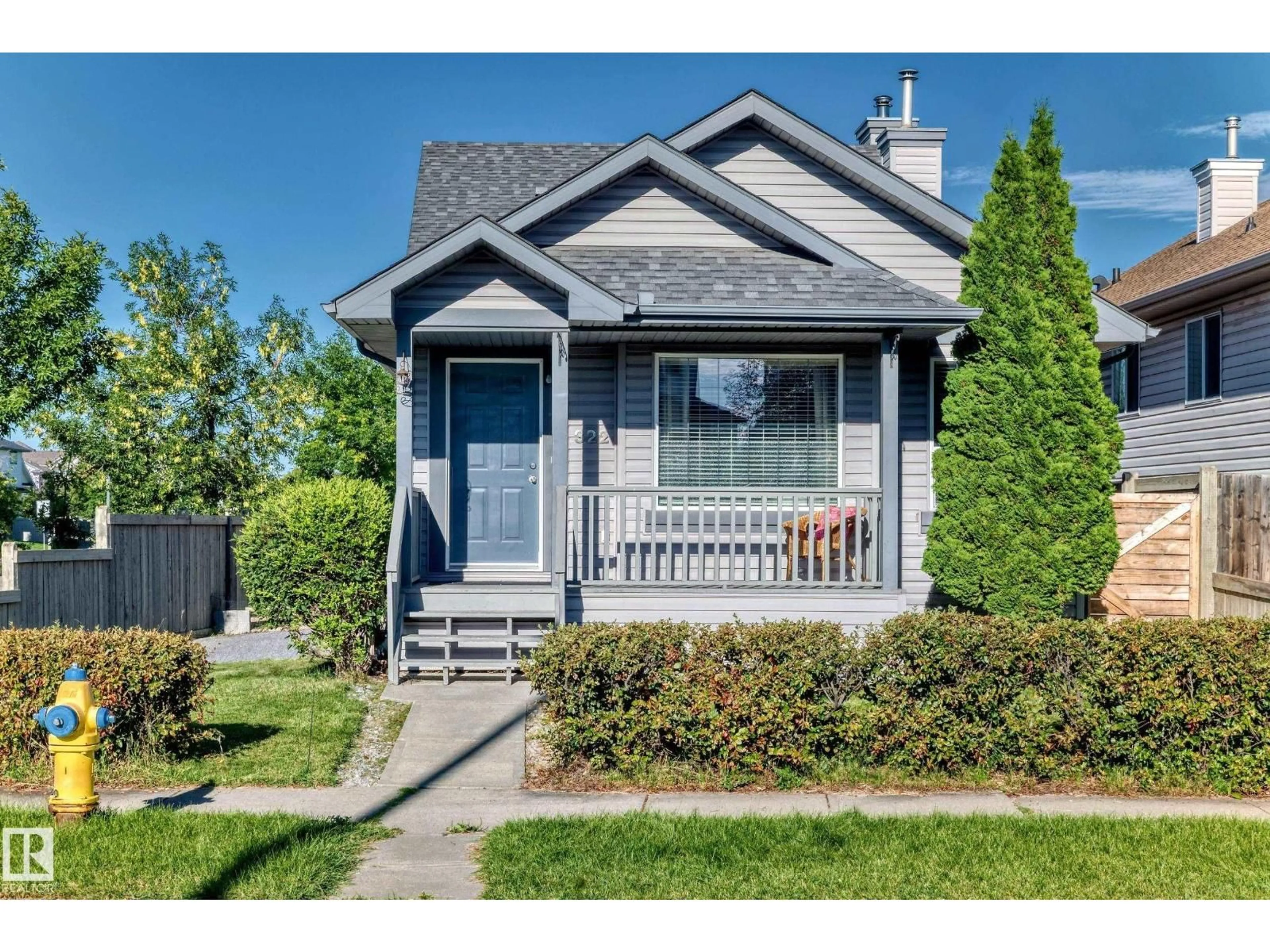 Home with vinyl exterior material, street for 322 84 ST, Edmonton Alberta T6X1H8
