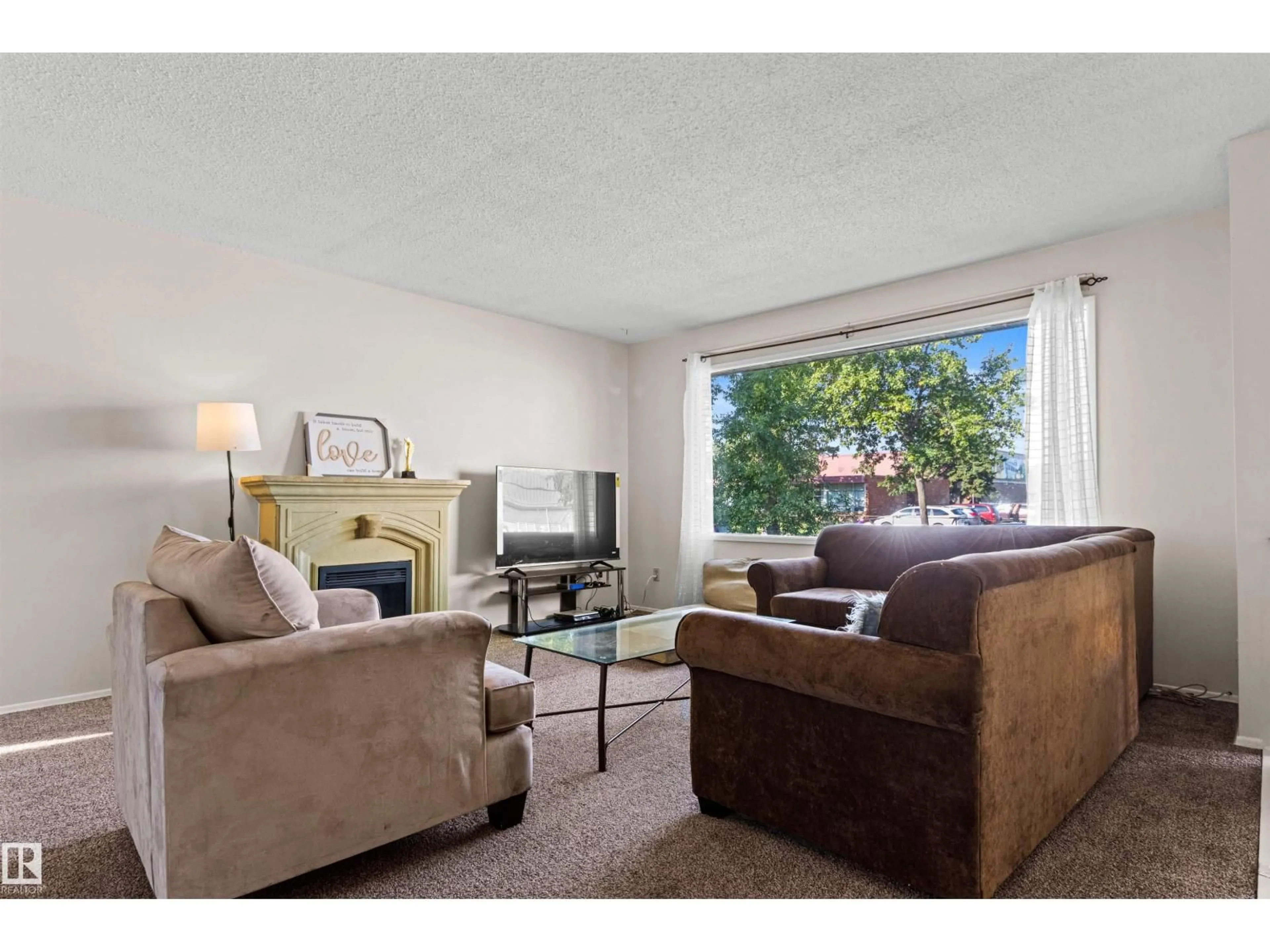 Living room with furniture, unknown for NW - 11703 38 ST, Edmonton Alberta T5W2H2