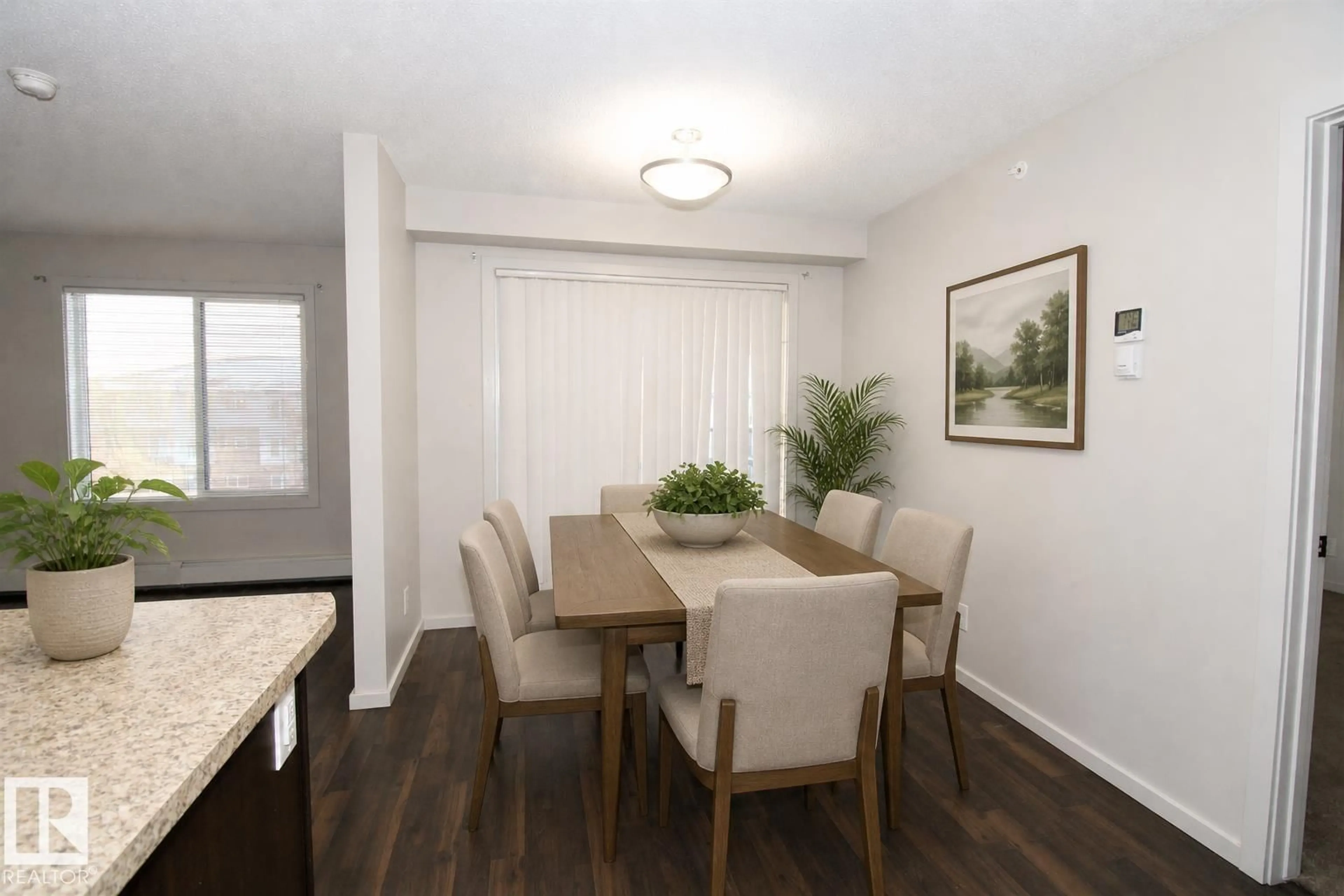 Dining room, wood/laminate floor for 430 5515 7 AV SW, Edmonton Alberta T6X2A8