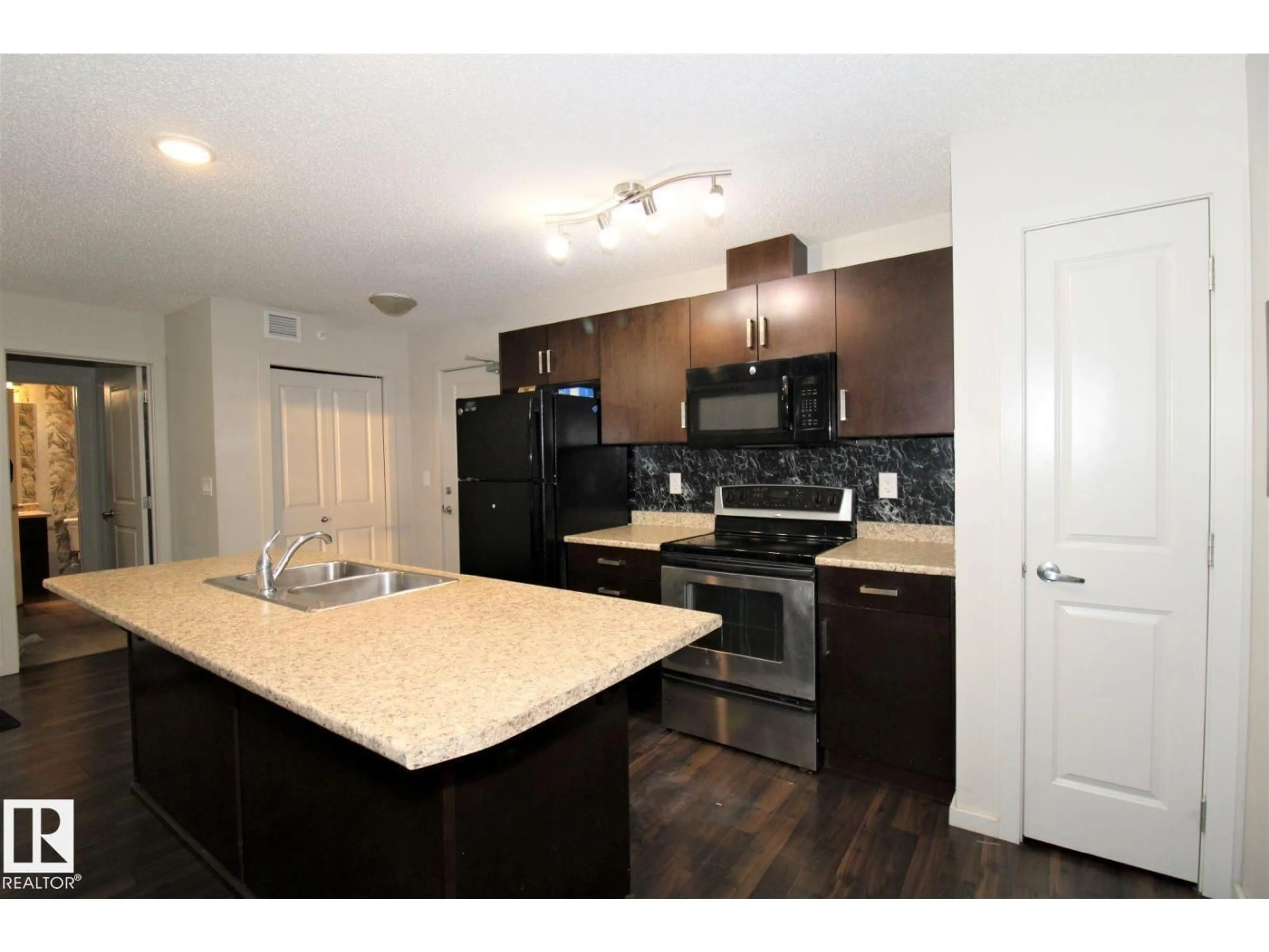 Standard kitchen, wood/laminate floor for 430 5515 7 AV SW, Edmonton Alberta T6X2A8