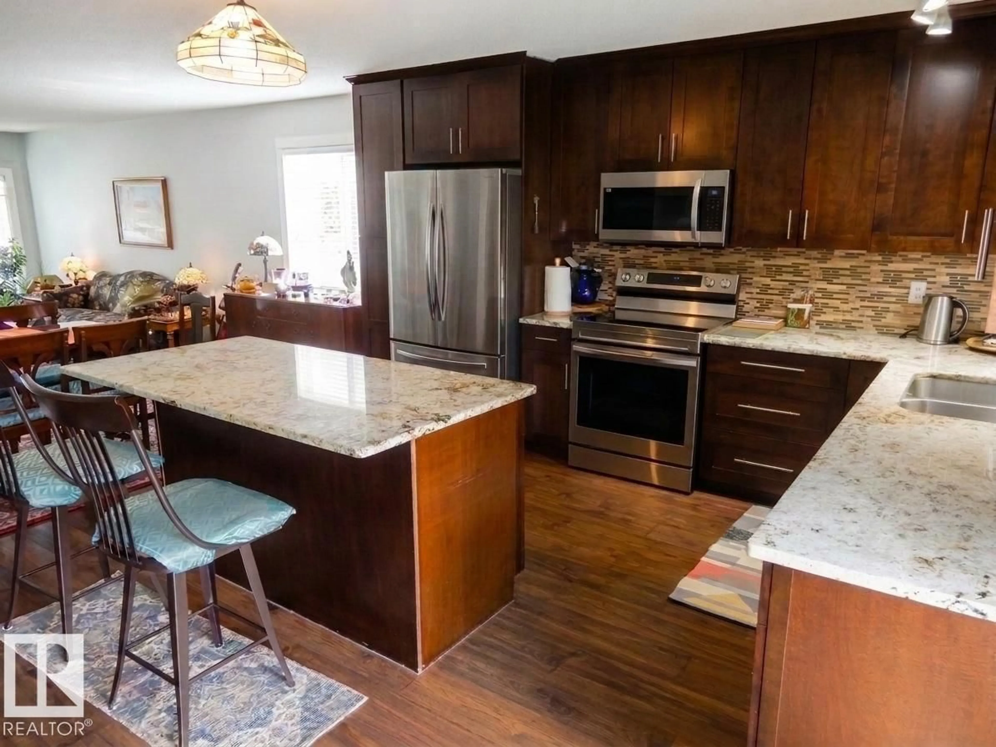 Open concept kitchen, unknown for 17824 93 ST, Edmonton Alberta T5Z2H8