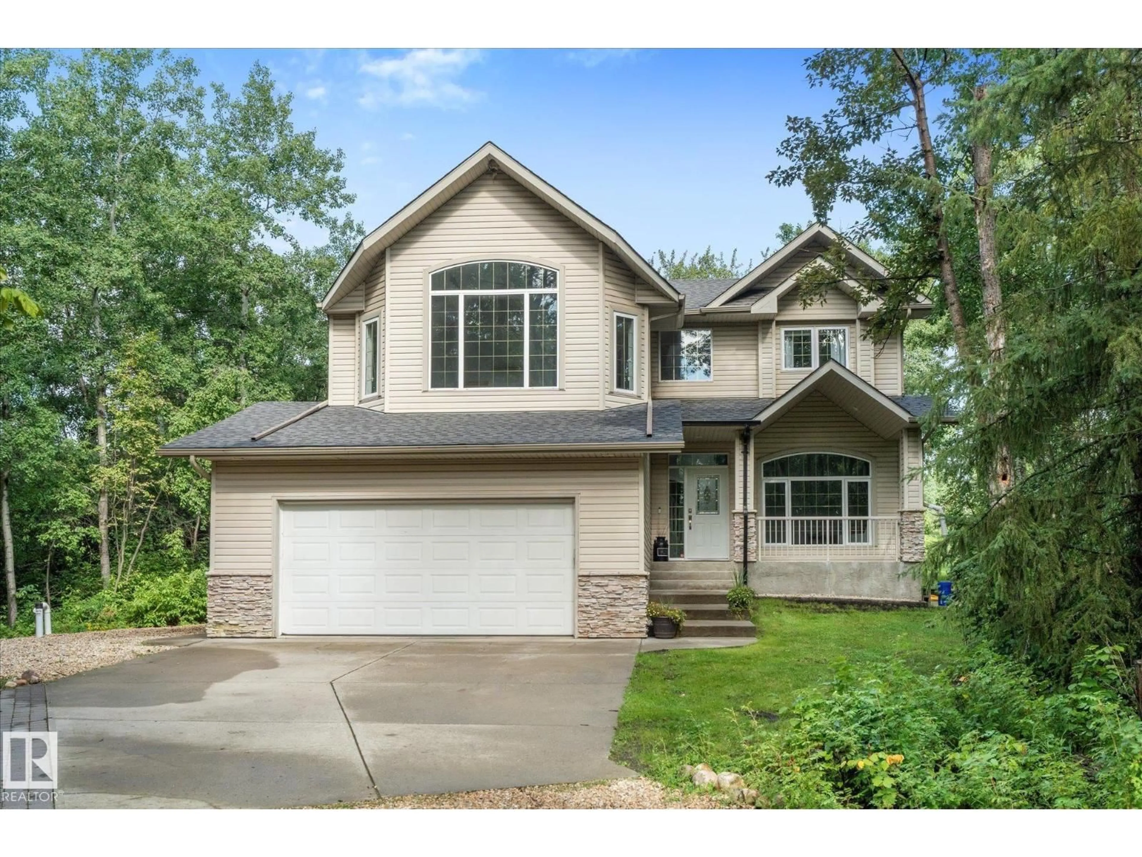 Home with vinyl exterior material, street for 13 27107 TWP ROAD 510, Rural Parkland County Alberta T7Y1H6