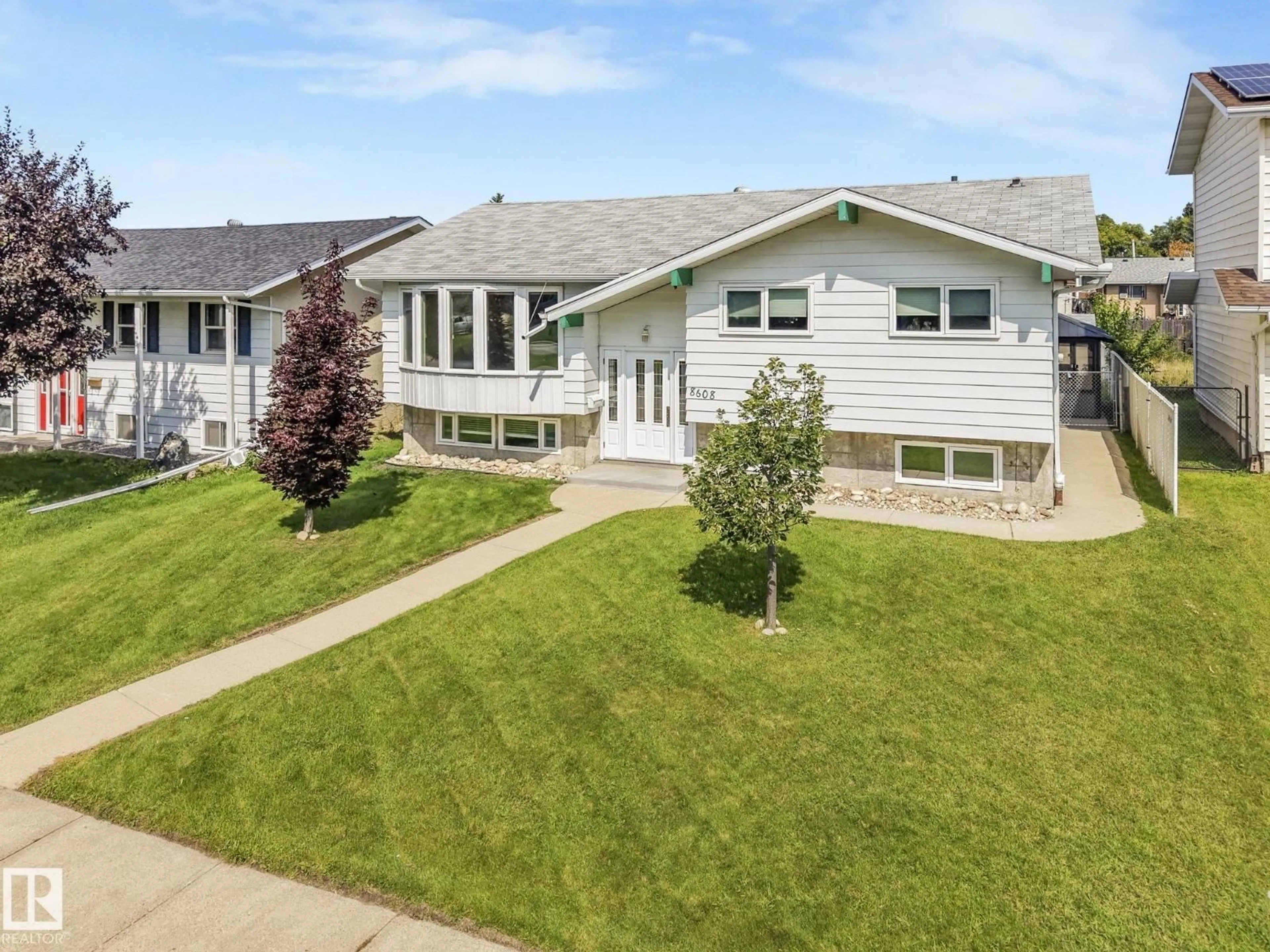 Home with vinyl exterior material, street for 8608 152A AV, Edmonton Alberta T5E3B2