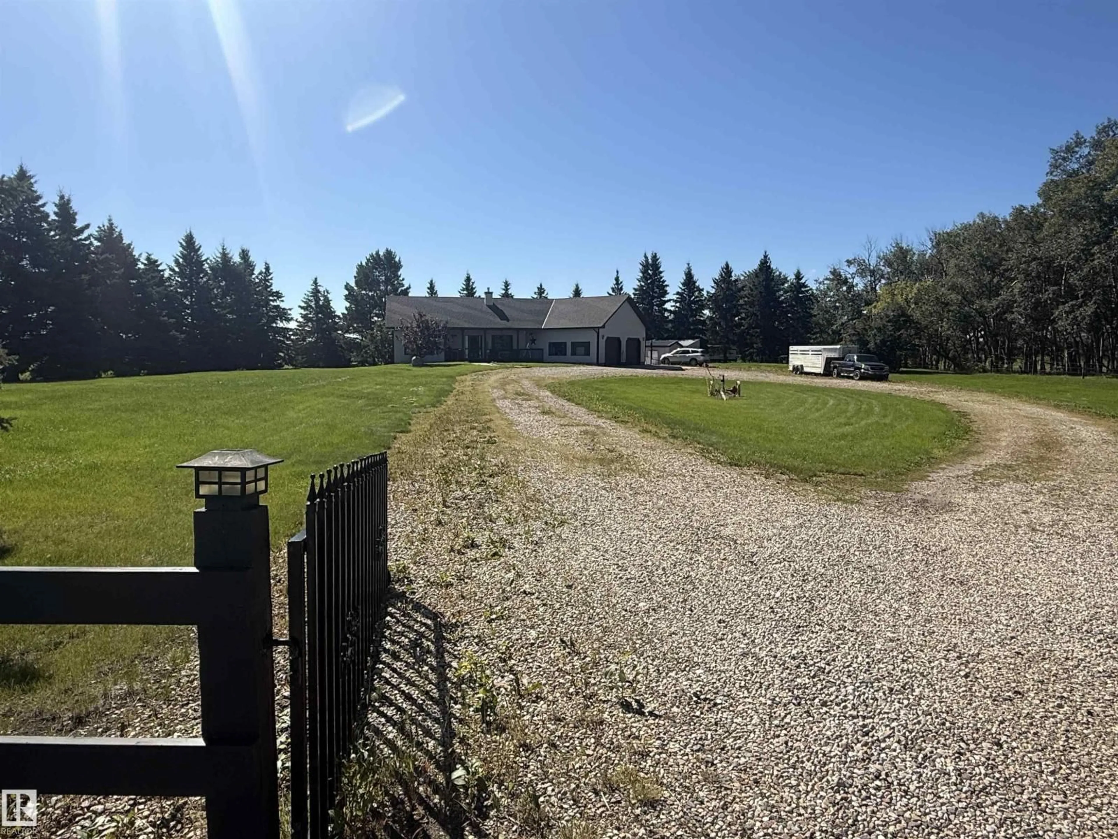 A pic from outside/outdoor area/front of a property/back of a property/a pic from drone, mountain view for 27519 79 AV, Stony Plain Alberta T7Z1Y4