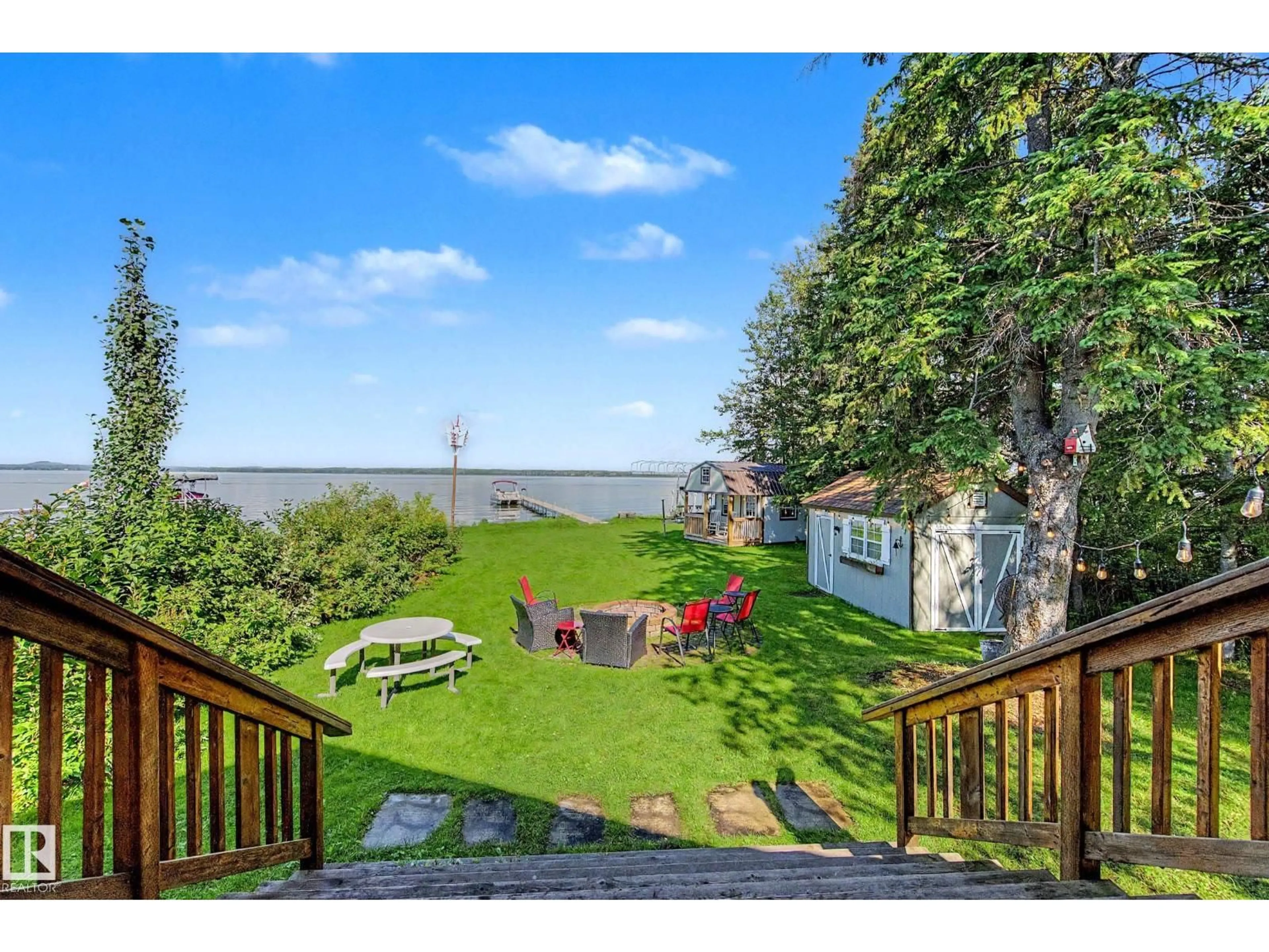 A pic from outside/outdoor area/front of a property/back of a property/a pic from drone, water/lake/river/ocean view for 624 LAKESHORE DR, Rural Wetaskiwin County Alberta T0C0T0