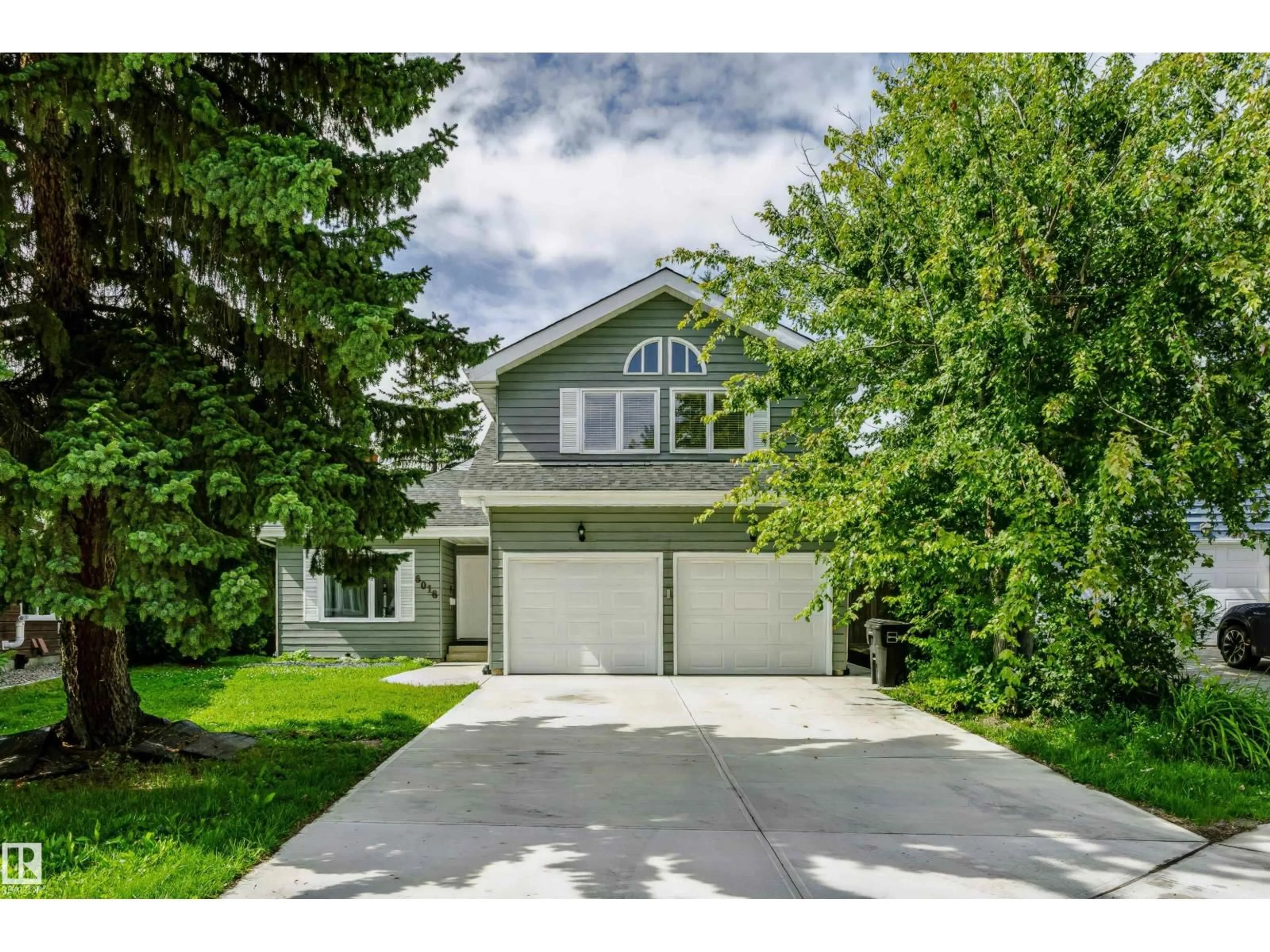 Home with vinyl exterior material, street for NW - 6016 177 ST, Edmonton Alberta T6M1H8