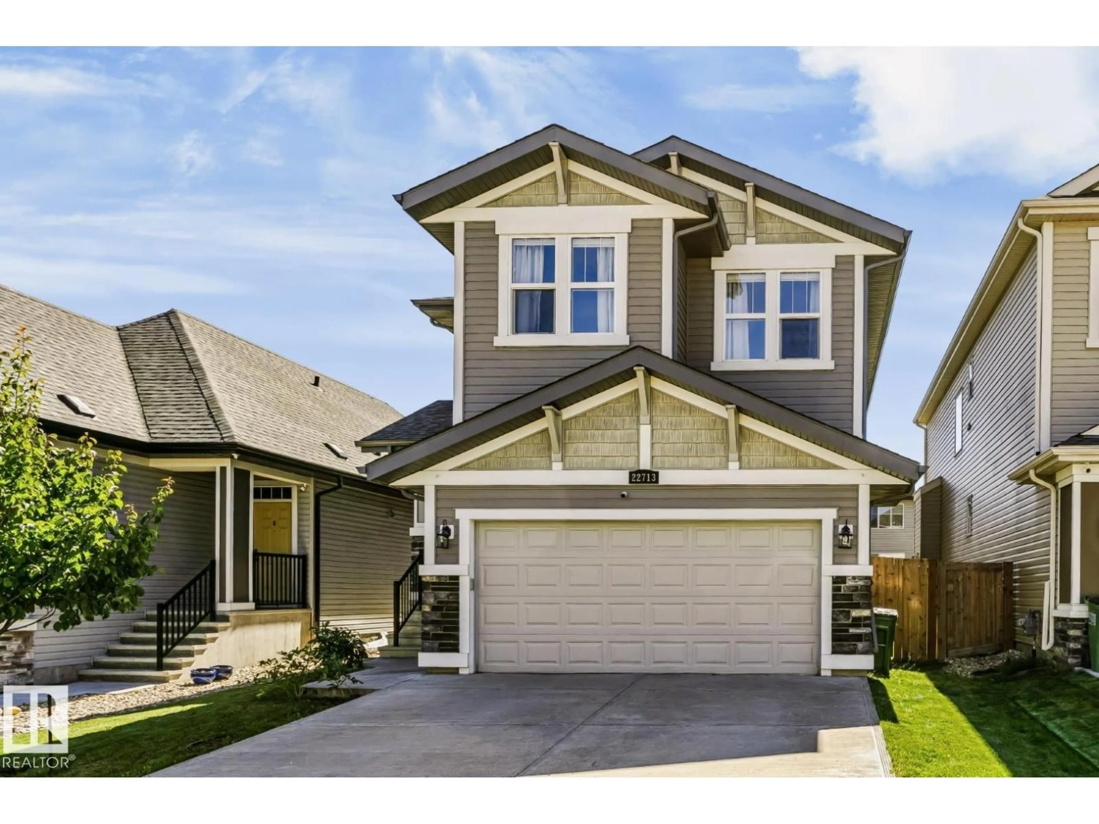 Home with vinyl exterior material, street for 22713 94A AV, Edmonton Alberta T5T7B2