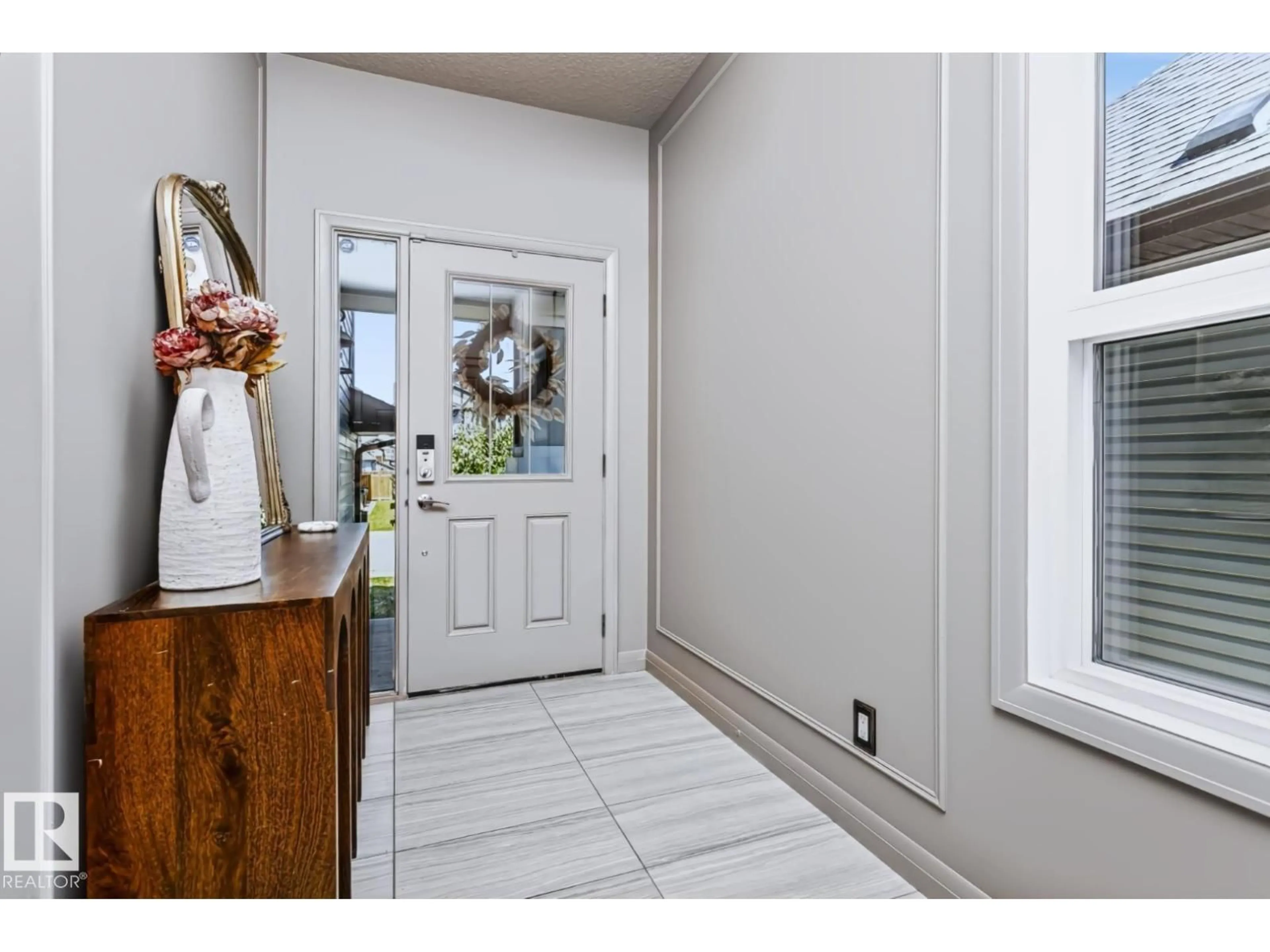 Indoor entryway for 22713 94A AV, Edmonton Alberta T5T7B2