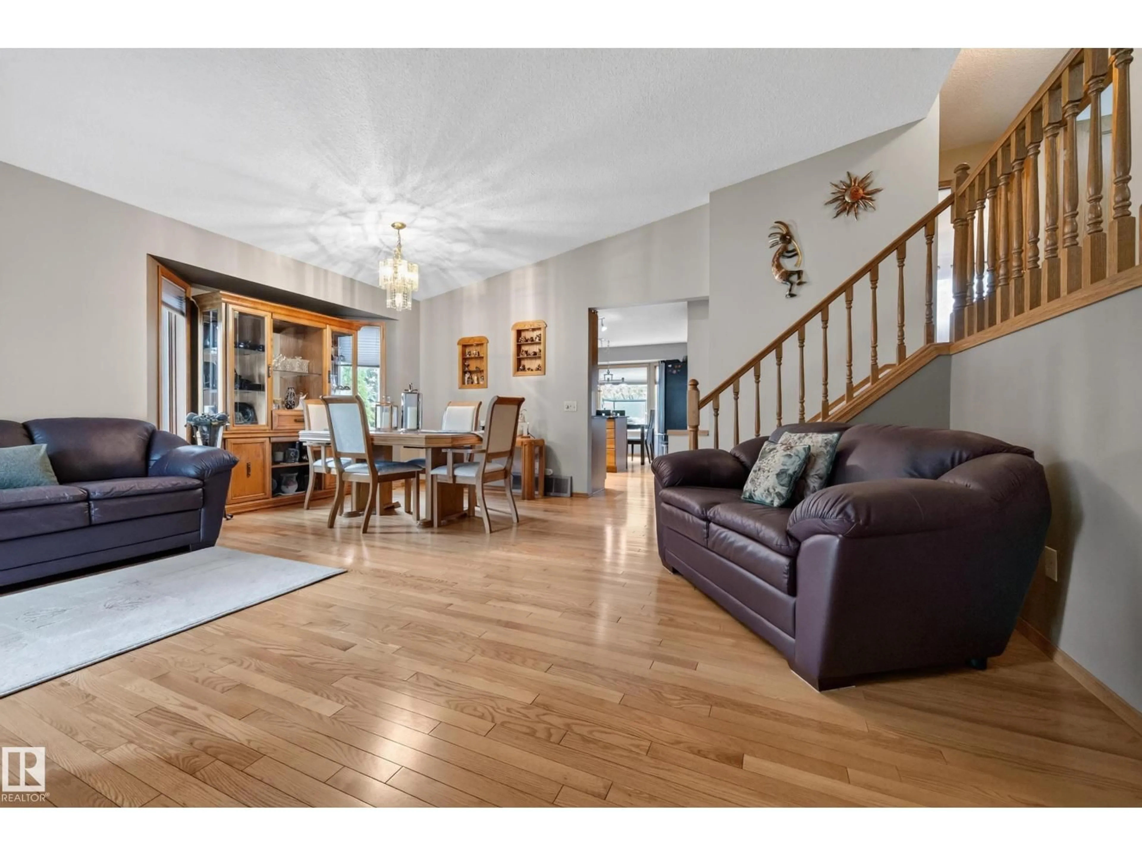 Living room with furniture, wood/laminate floor for 413 DAVENPORT PL, Sherwood Park Alberta T8H1R9