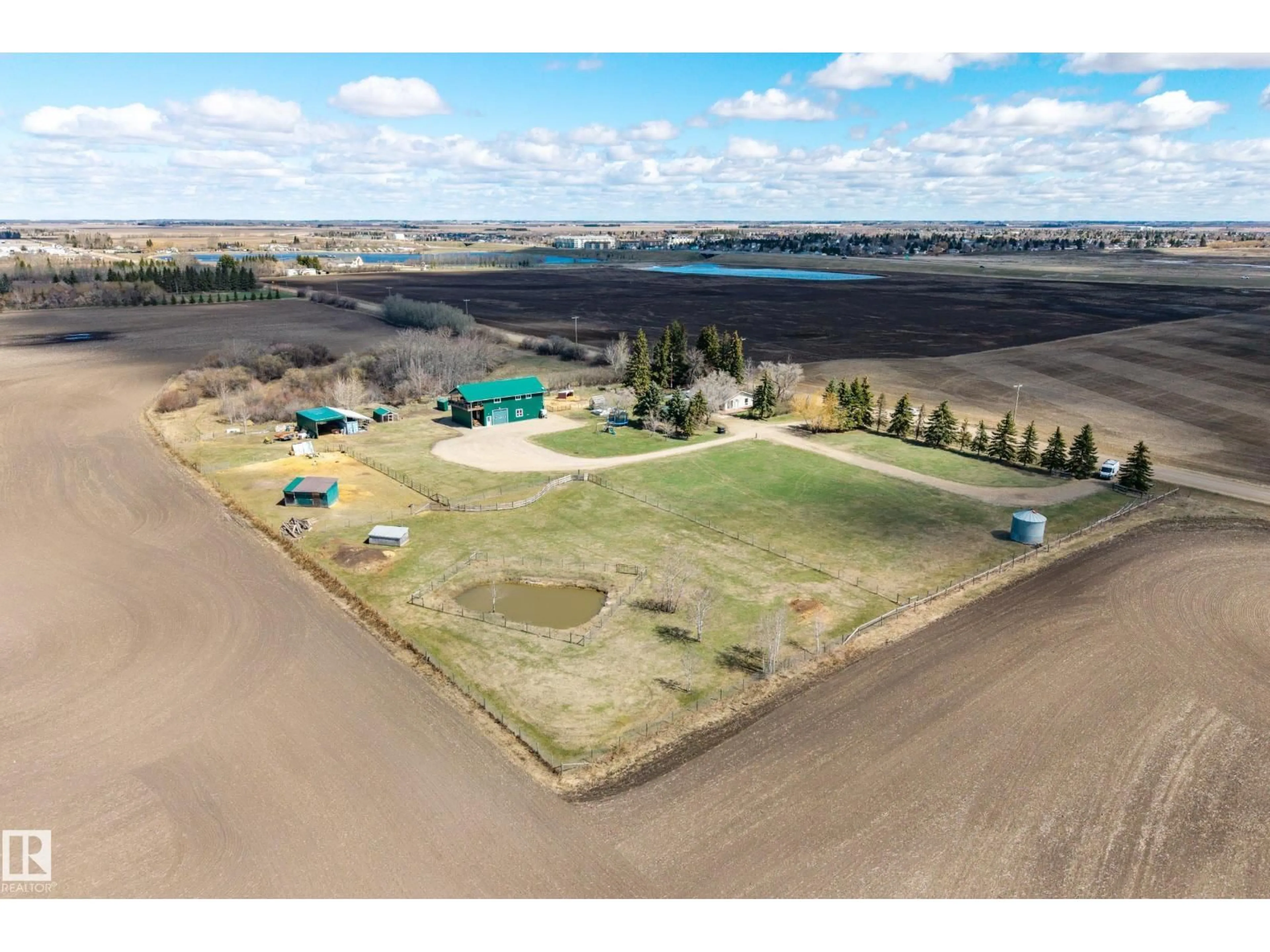 A pic from outside/outdoor area/front of a property/back of a property/a pic from drone, water/lake/river/ocean view for 55506 RGE ROAD 254, Rural Sturgeon County Alberta T8R1A1
