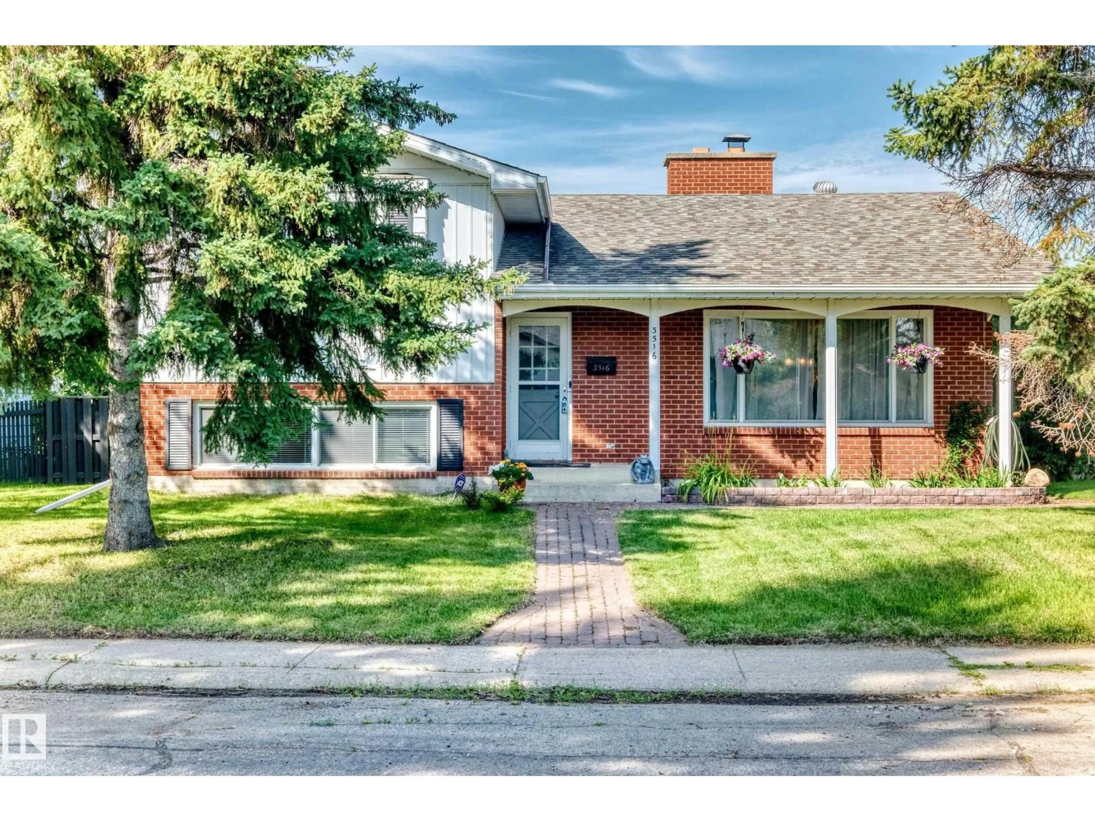 Home with brick exterior material, street for 3516 117A ST NW, Edmonton Alberta T6J1V4