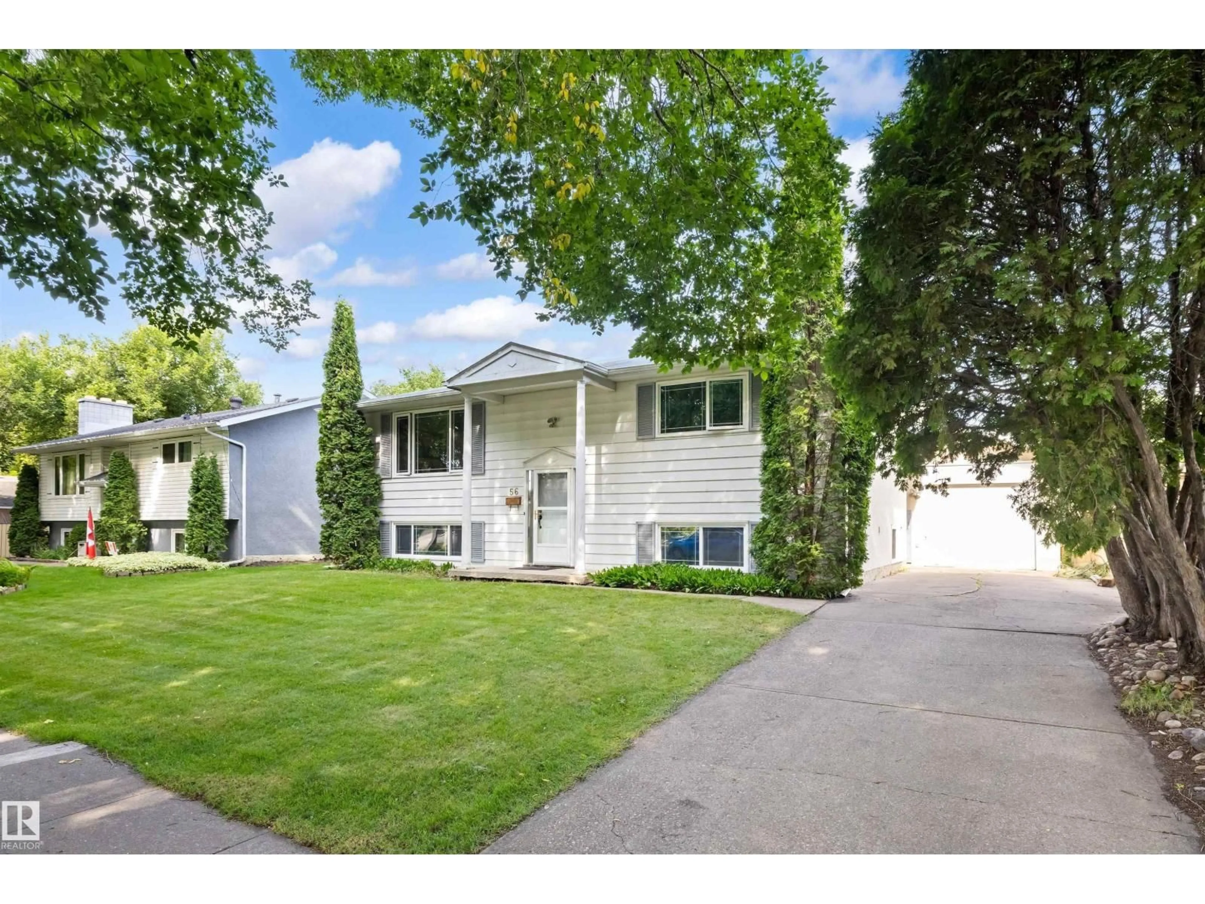 Home with vinyl exterior material, street for 56 FLAGSTONE CR, St. Albert Alberta T8N1R3