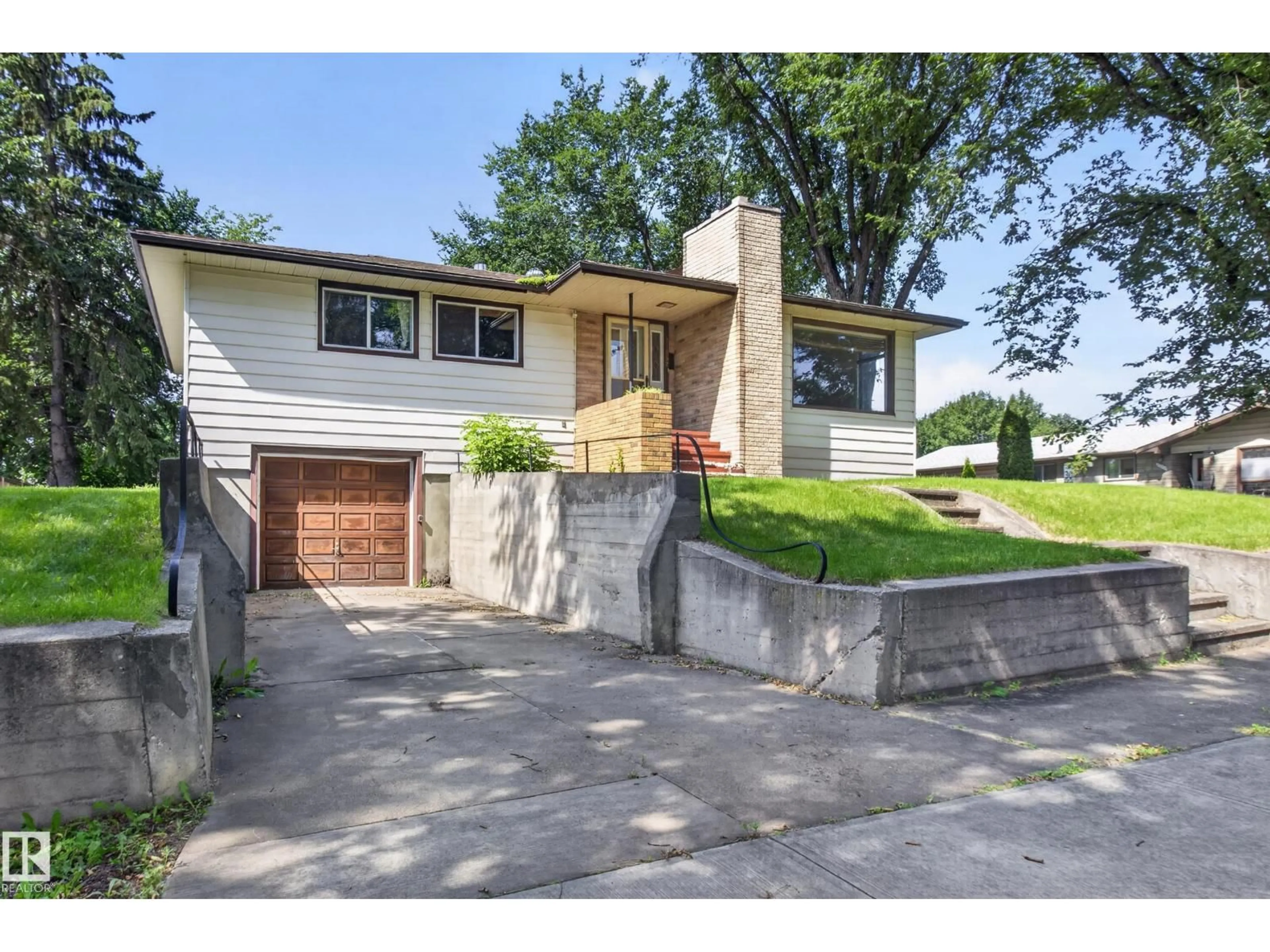 Home with brick exterior material, street for NW - 11852 55 ST, Edmonton Alberta T5W3P8