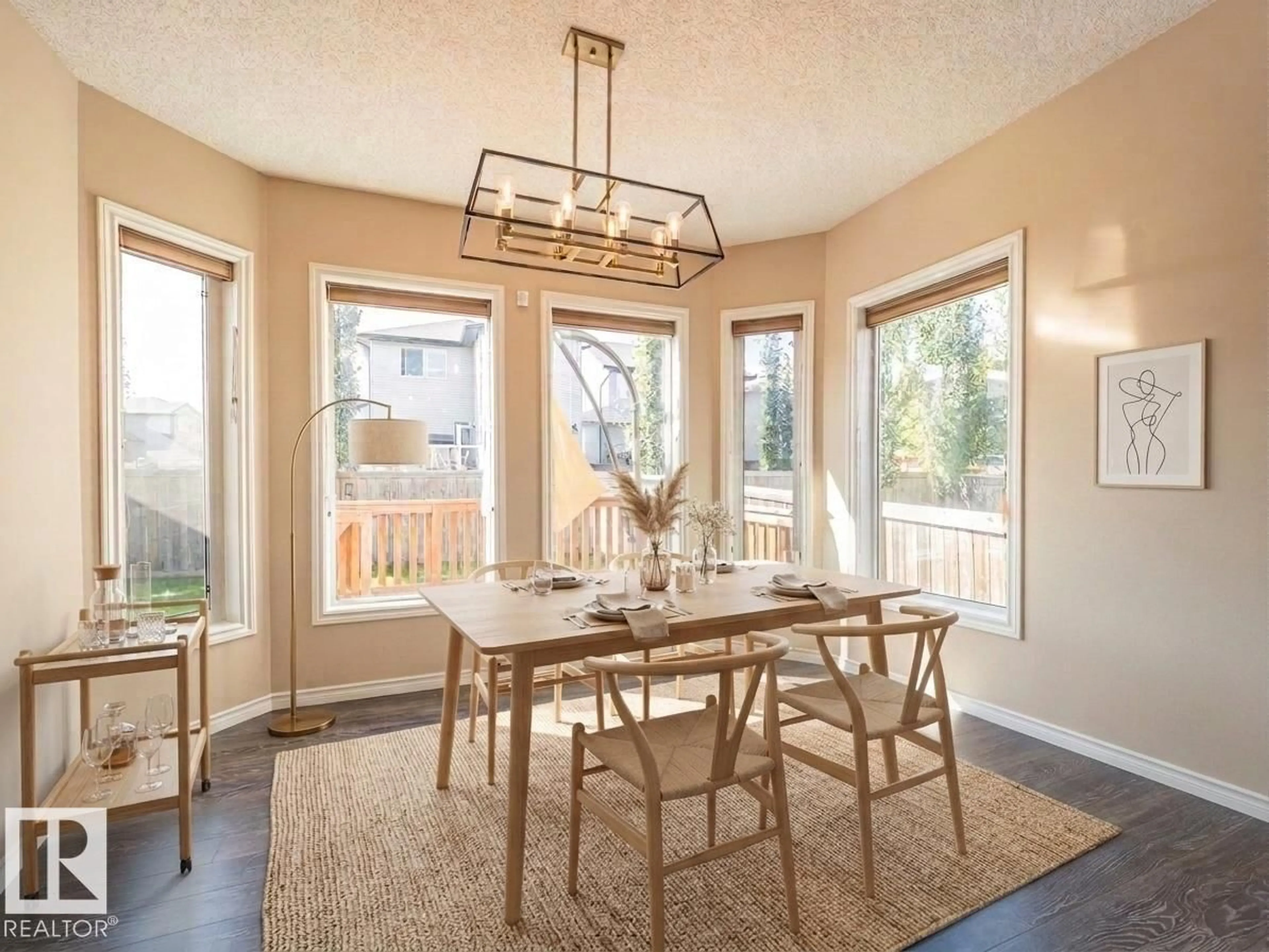 Dining room, wood/laminate floor for 3233 21A AV, Edmonton Alberta T6T0K5