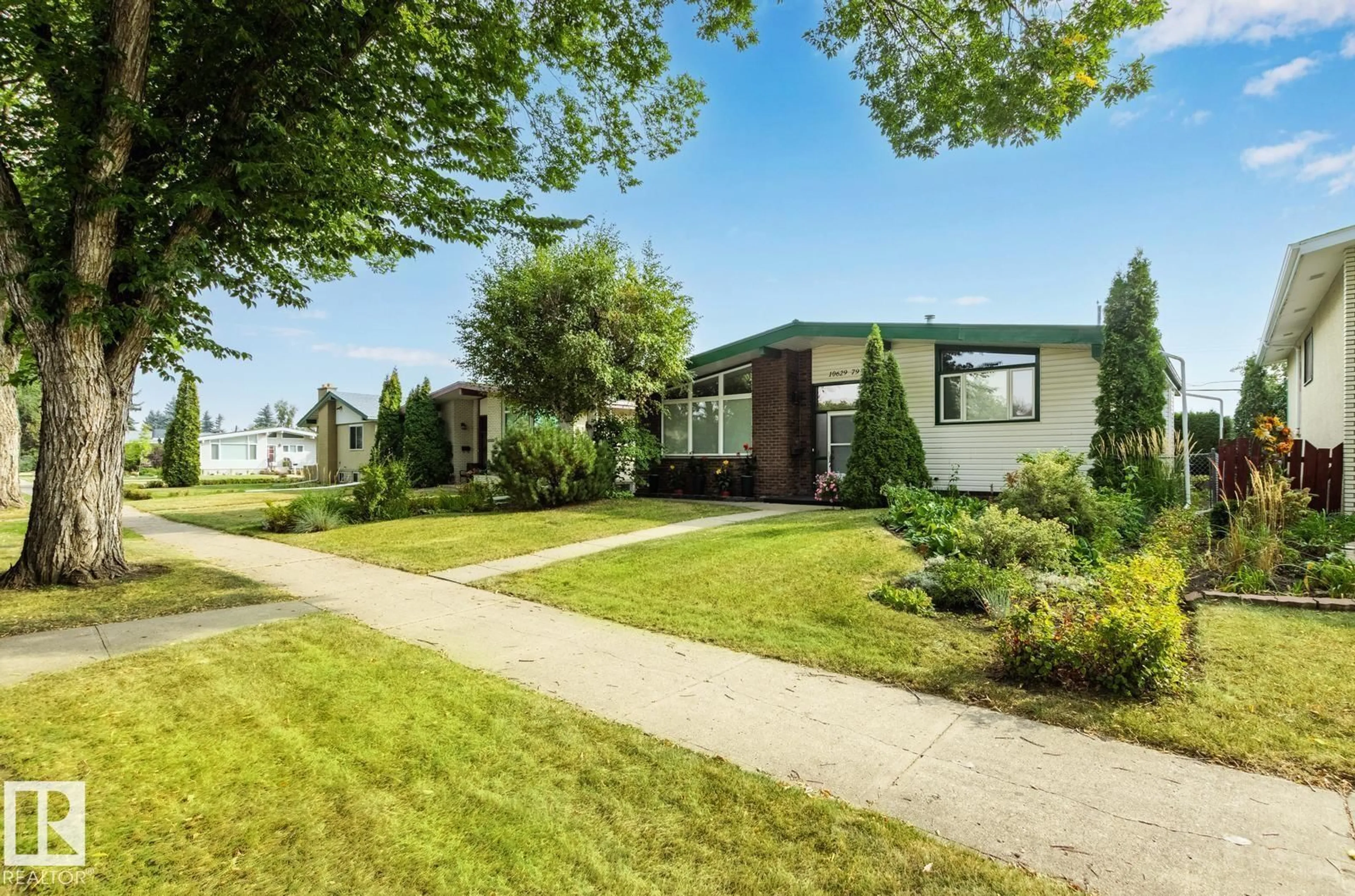 A pic from outside/outdoor area/front of a property/back of a property/a pic from drone, street for 10629 79 ST, Edmonton Alberta T6A3H5