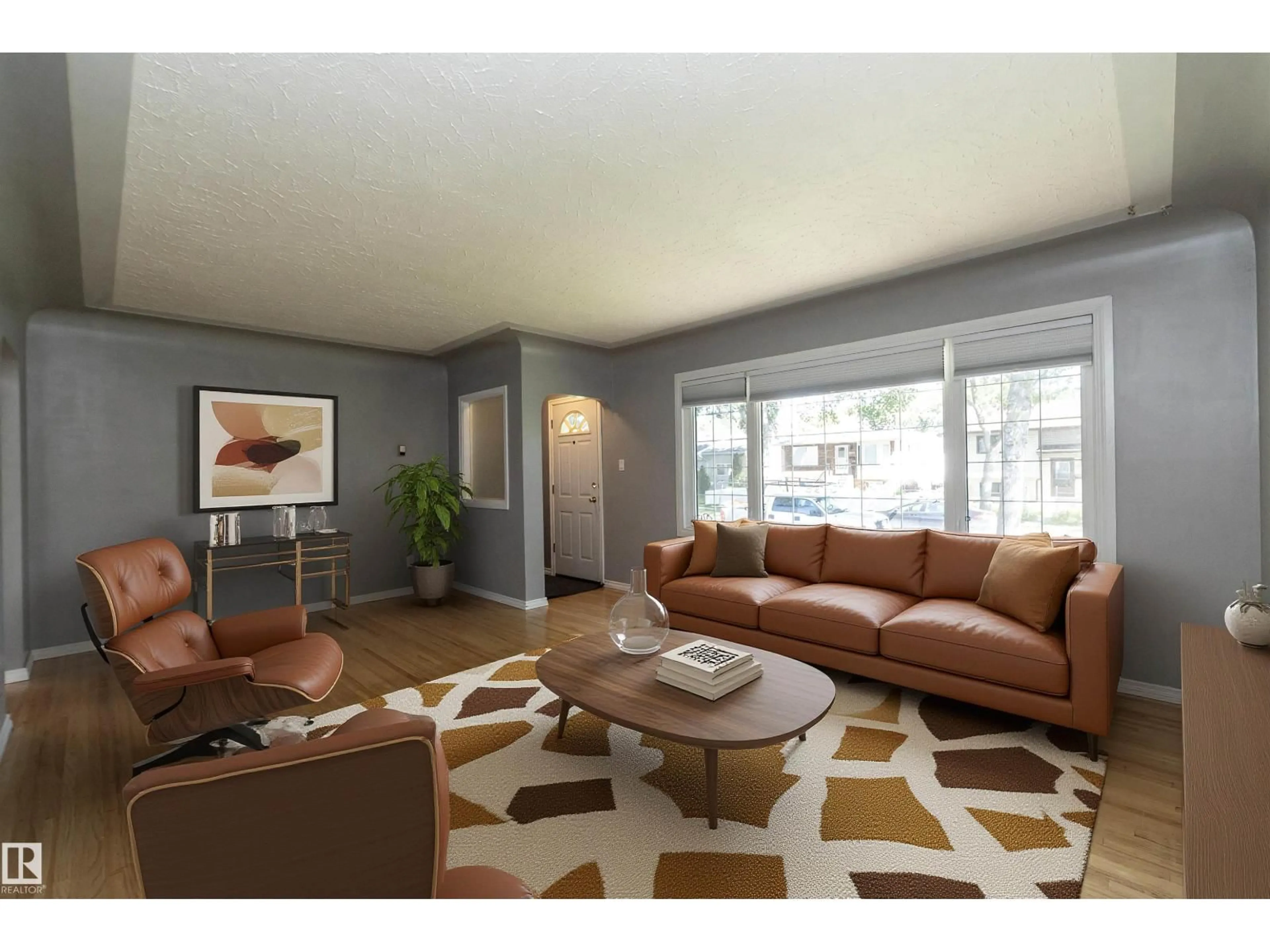 Living room with furniture, wood/laminate floor for 12322 94 ST, Edmonton Alberta T5G1K3