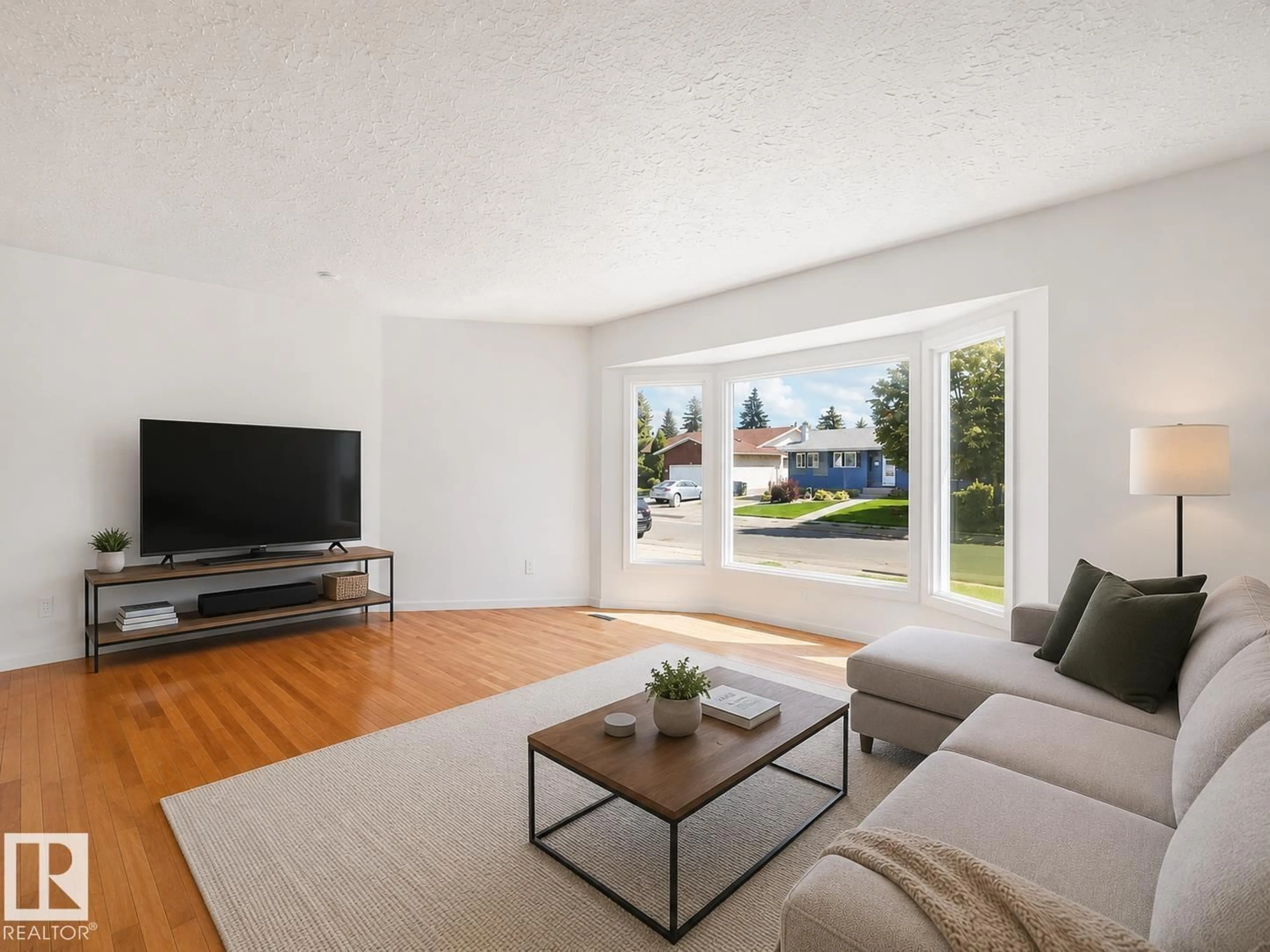 Living room with furniture, unknown for 11616 158 AV, Edmonton Alberta T5X2K4