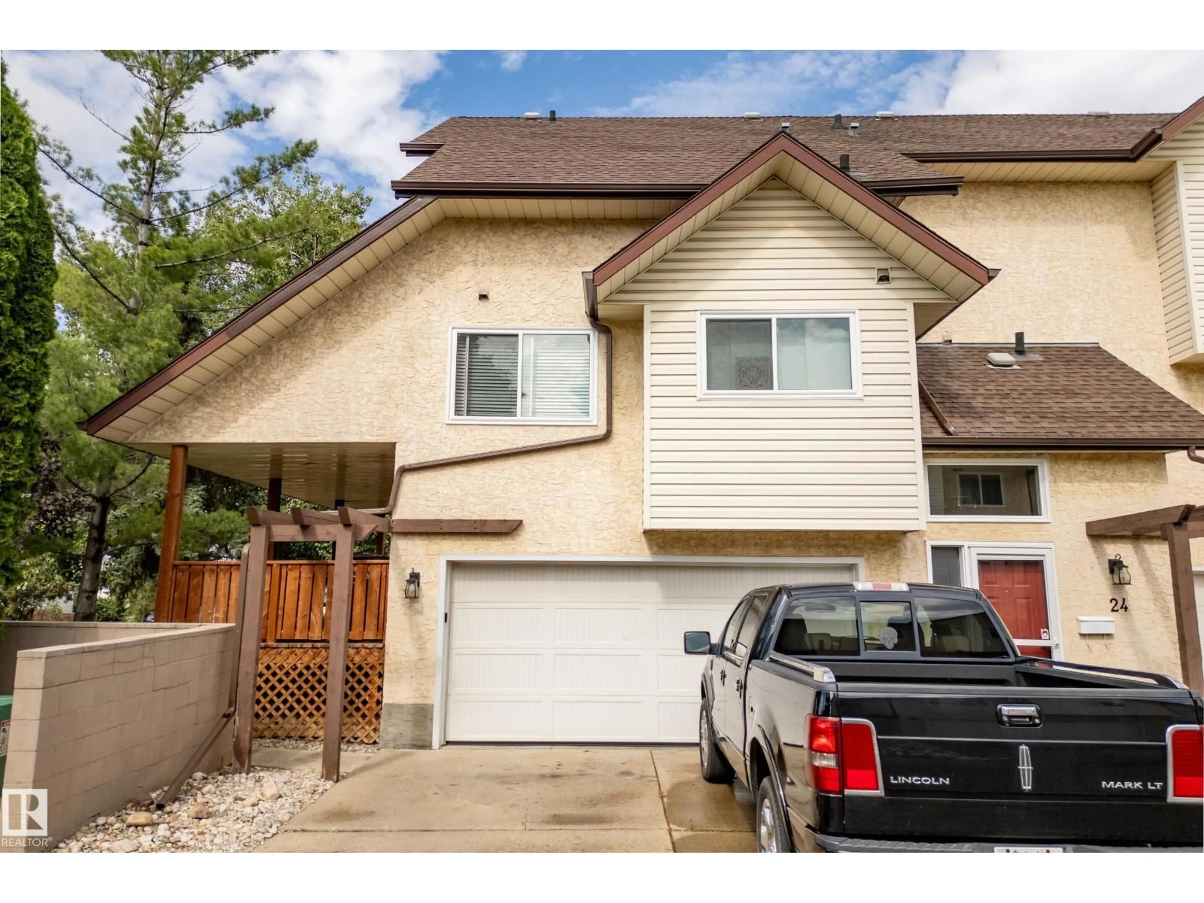 Home with vinyl exterior material, street for 25 - 3811 85 ST, Edmonton Alberta T6K4C7