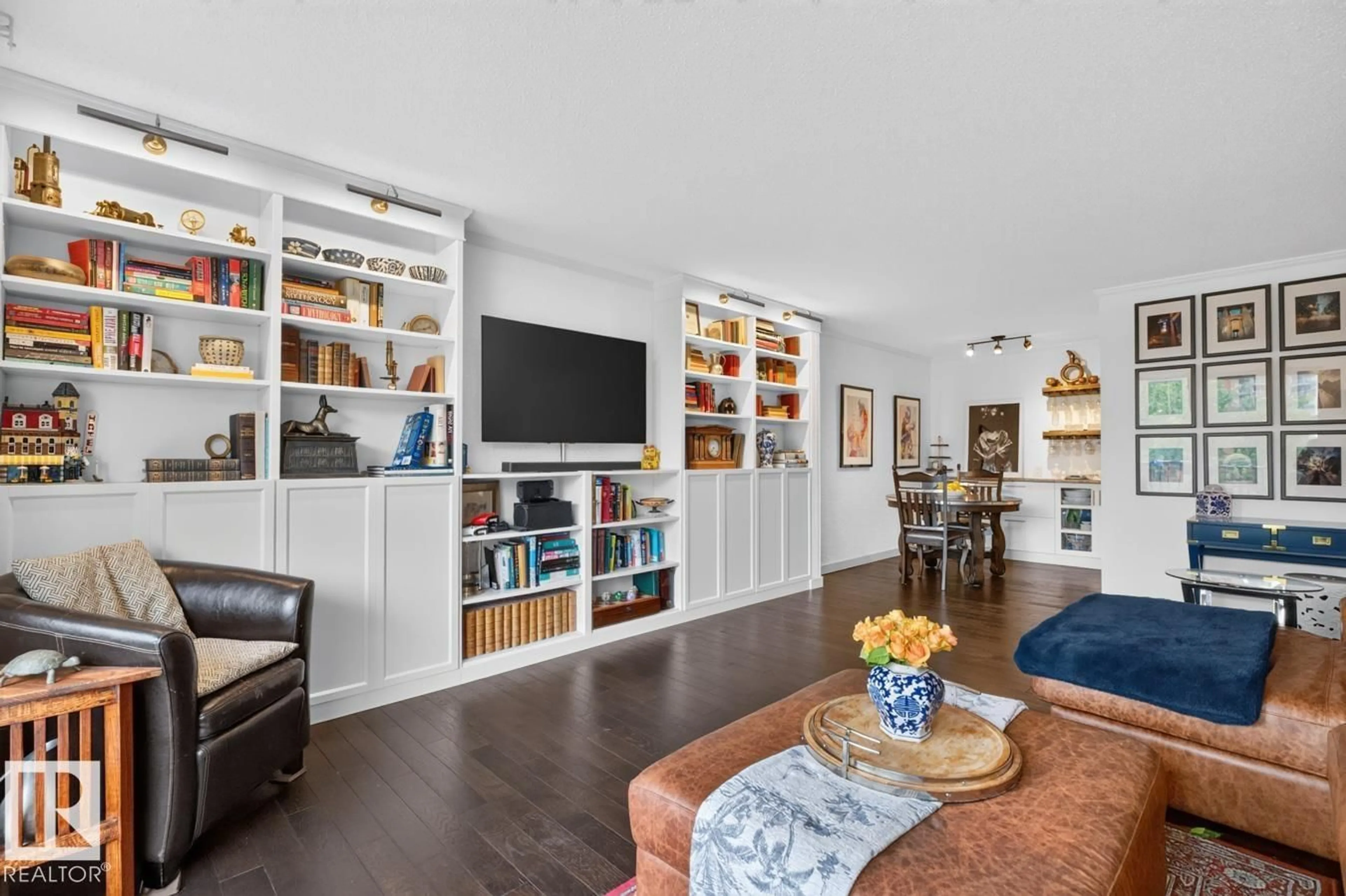 Living room with furniture, wood/laminate floor for #306 - 11307 99 AV, Edmonton Alberta T5K0H2