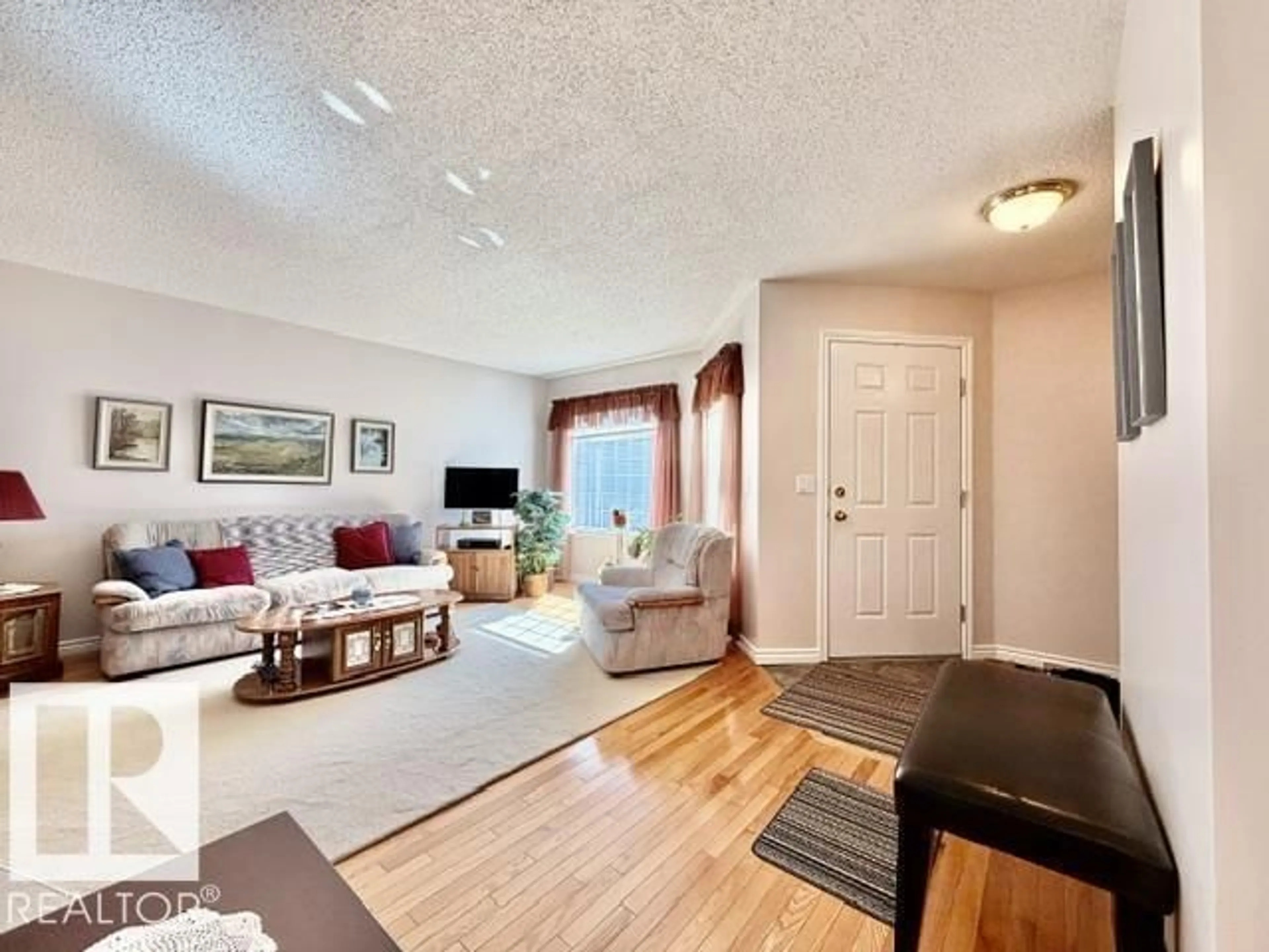 Living room with furniture, unknown for #4 - 5714 50 ST, Wetaskiwin Alberta T9A3R3