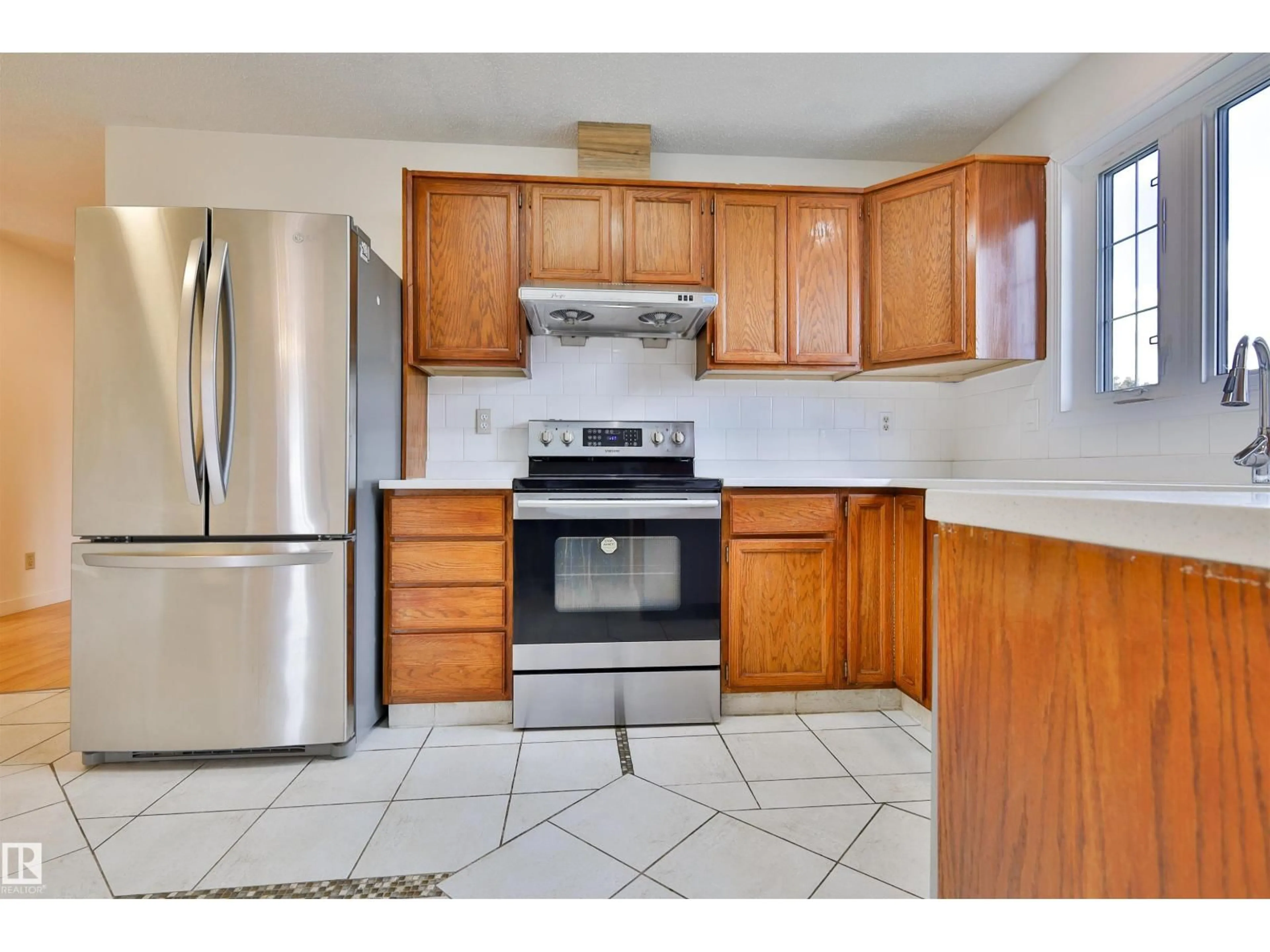 Standard kitchen, ceramic/tile floor for 12229 39 ST, Edmonton Alberta T5W2K2