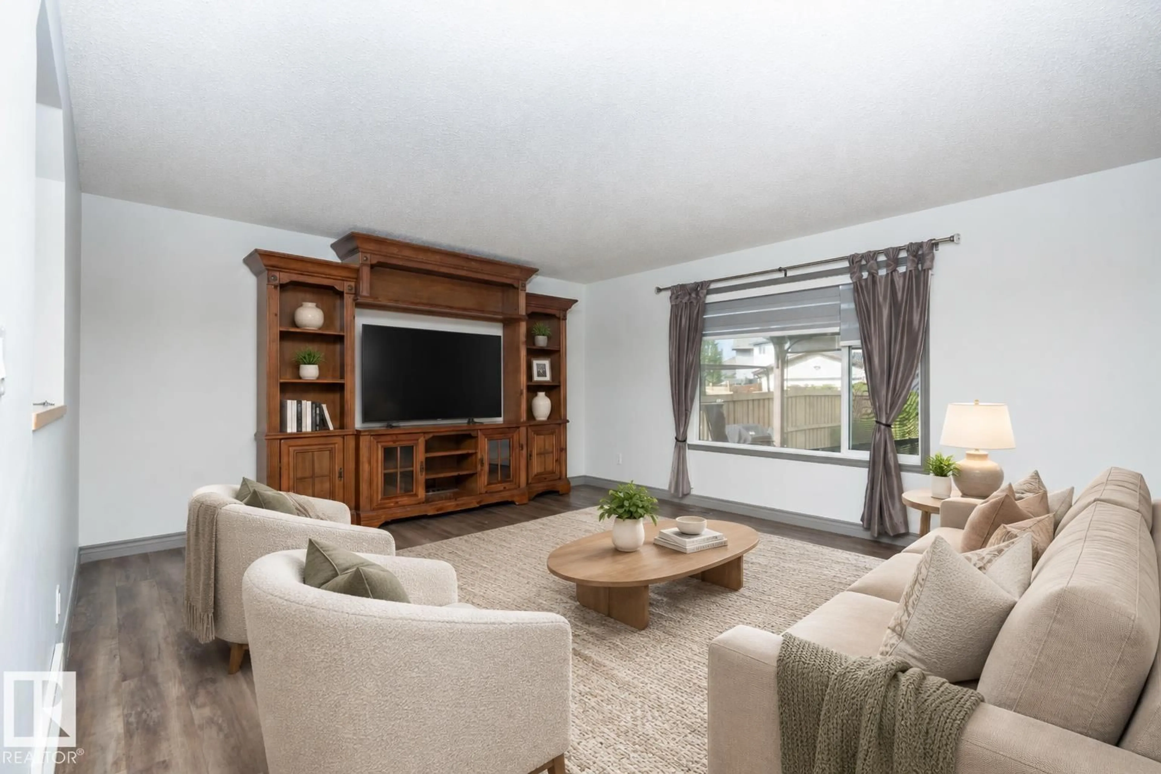 Living room with furniture, unknown for 16820 57 ST, Edmonton Alberta T5Y0K4