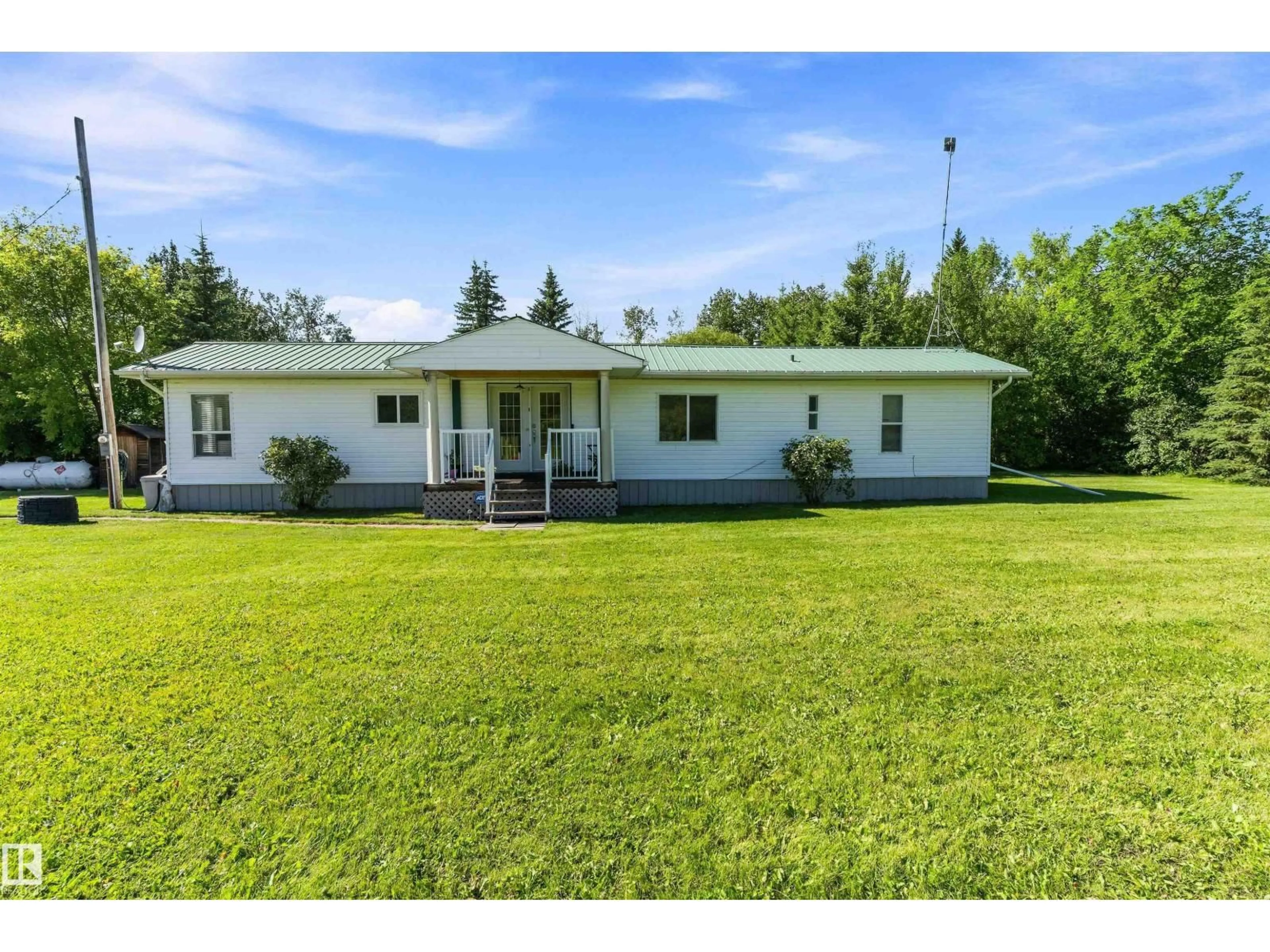 A pic from outside/outdoor area/front of a property/back of a property/a pic from drone, water/lake/river/ocean view for 254054 - 308 TWP ROAD 460, Rural Wetaskiwin County Alberta T9A1W8