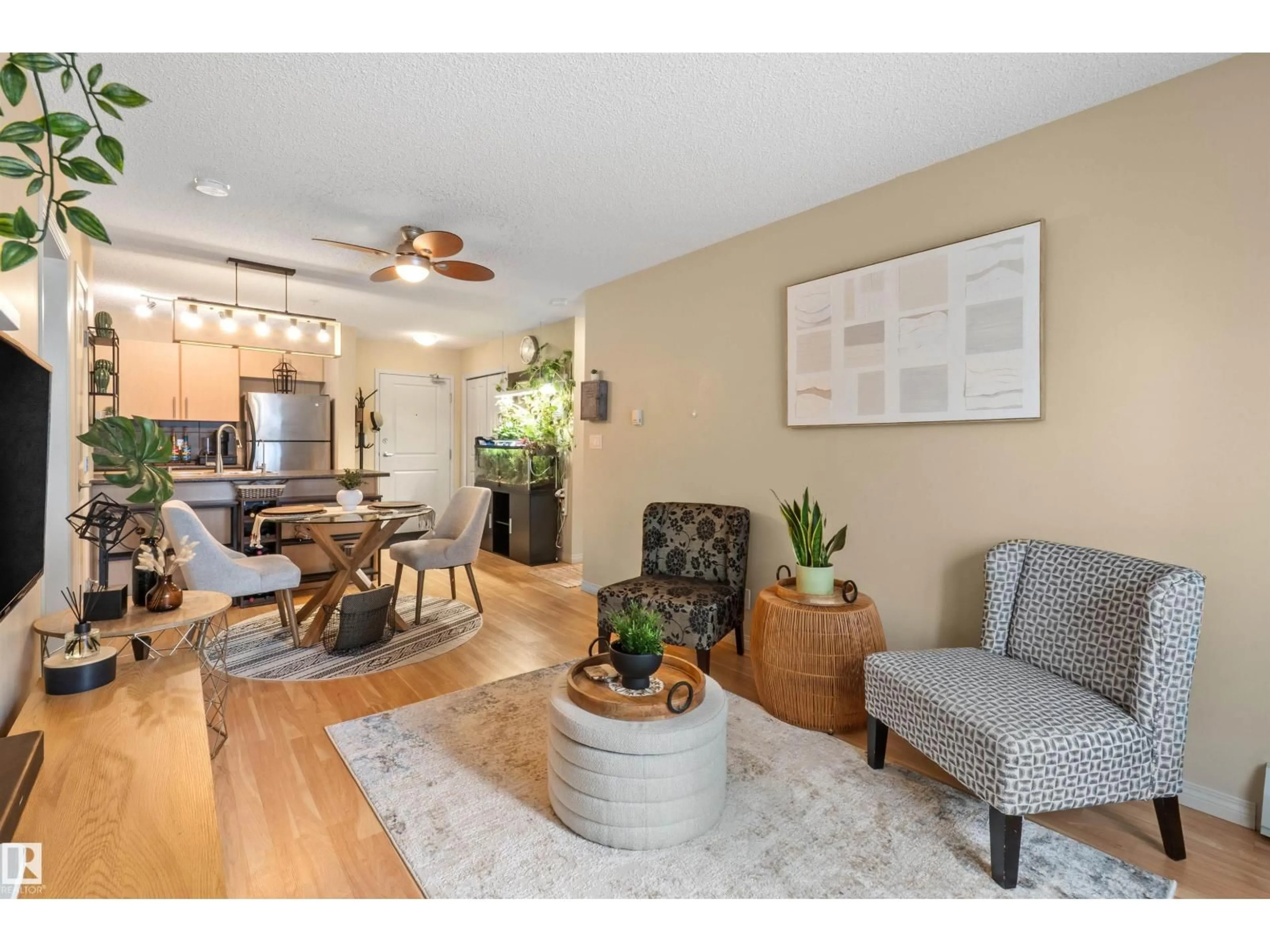 Living room with furniture, wood/laminate floor for #209 - 103 AMBLESIDE DRIVE, Edmonton Alberta T6W0J4