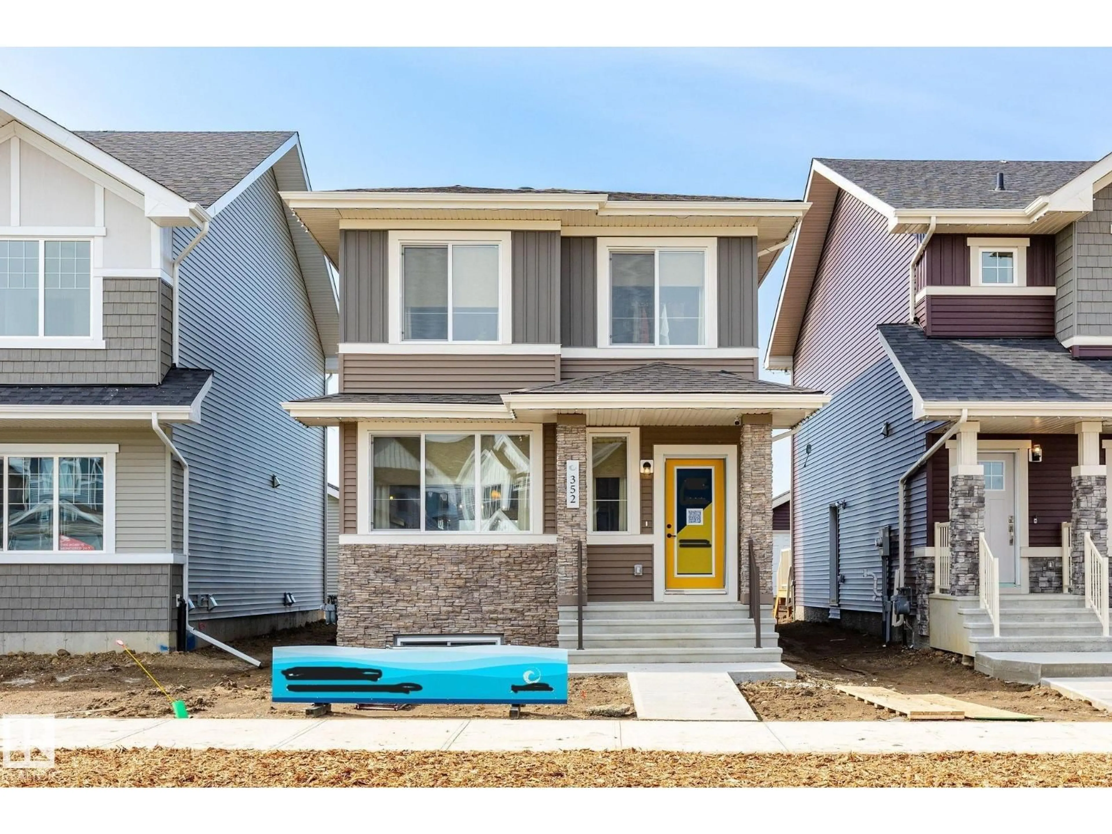Home with vinyl exterior material, street for 21204 25 AV, Edmonton Alberta T6M1L2