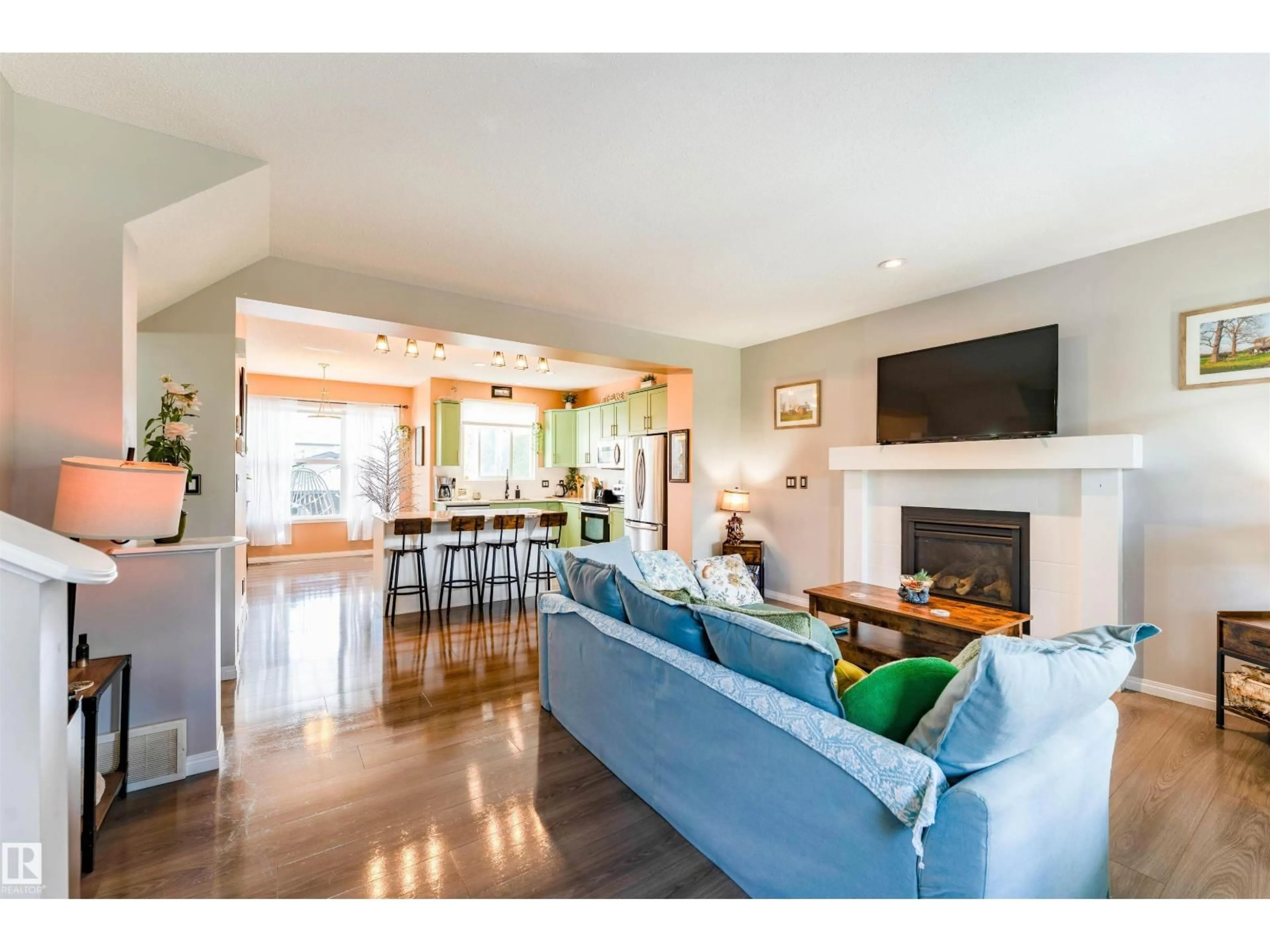 Open concept kitchen, wood/laminate floor for 725 SECORD BV, Edmonton Alberta T5T7A8