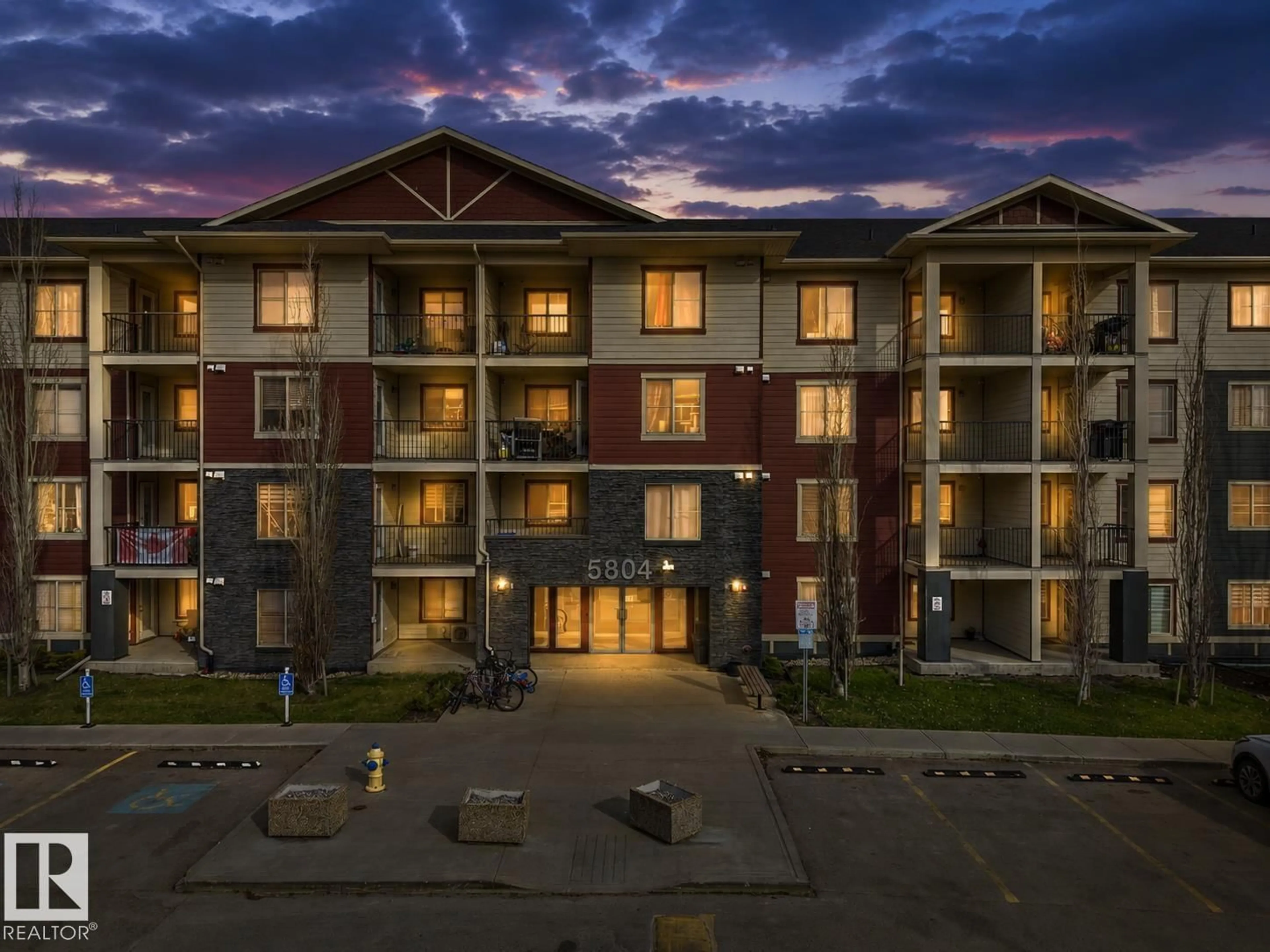 A pic from outside/outdoor area/front of a property/back of a property/a pic from drone, building for 5804 - 220 MULLEN PL, Edmonton Alberta T6R0W3