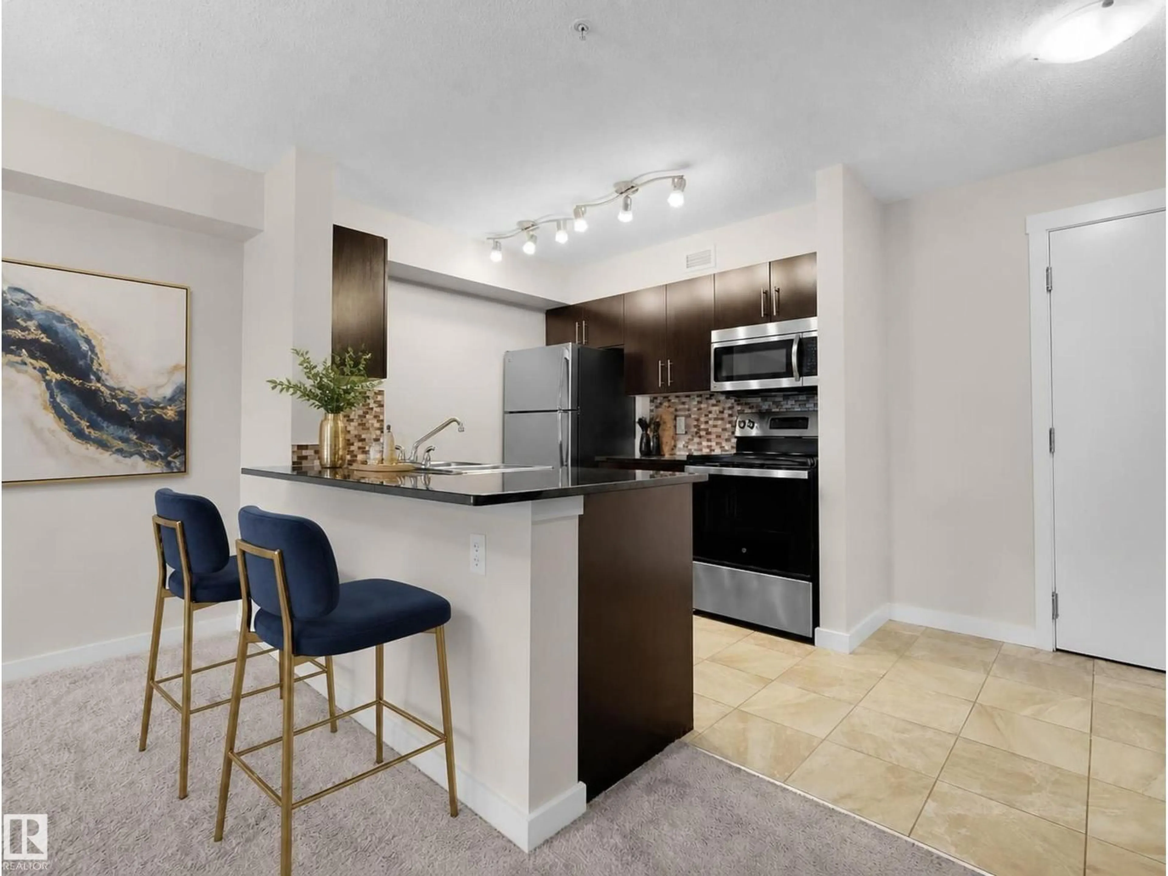 Open concept kitchen, unknown for 5804 - 220 MULLEN PL, Edmonton Alberta T6R0W3