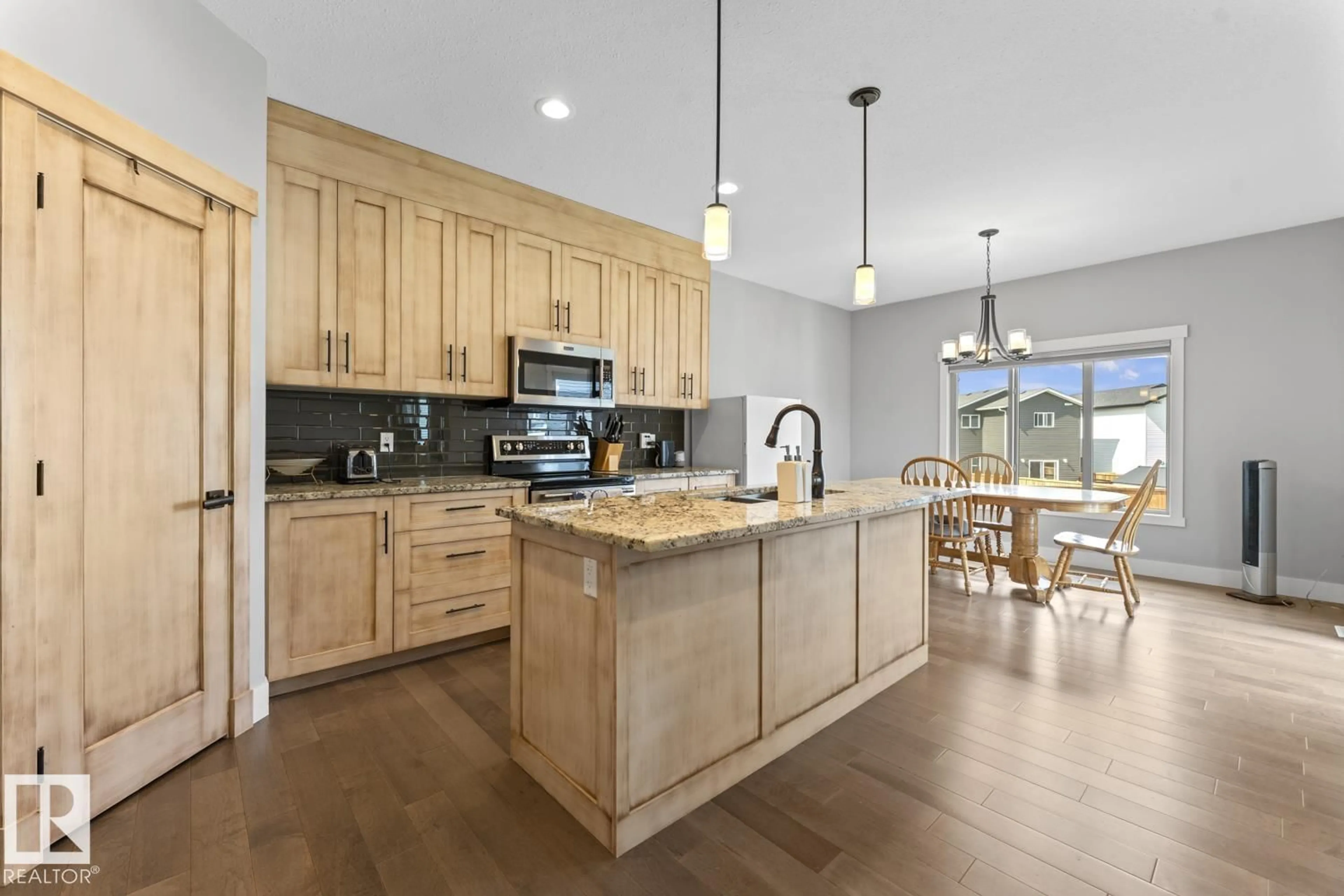 Open concept kitchen, ceramic/tile floor for 1416 18 AV, Cold Lake Alberta T9M0L8