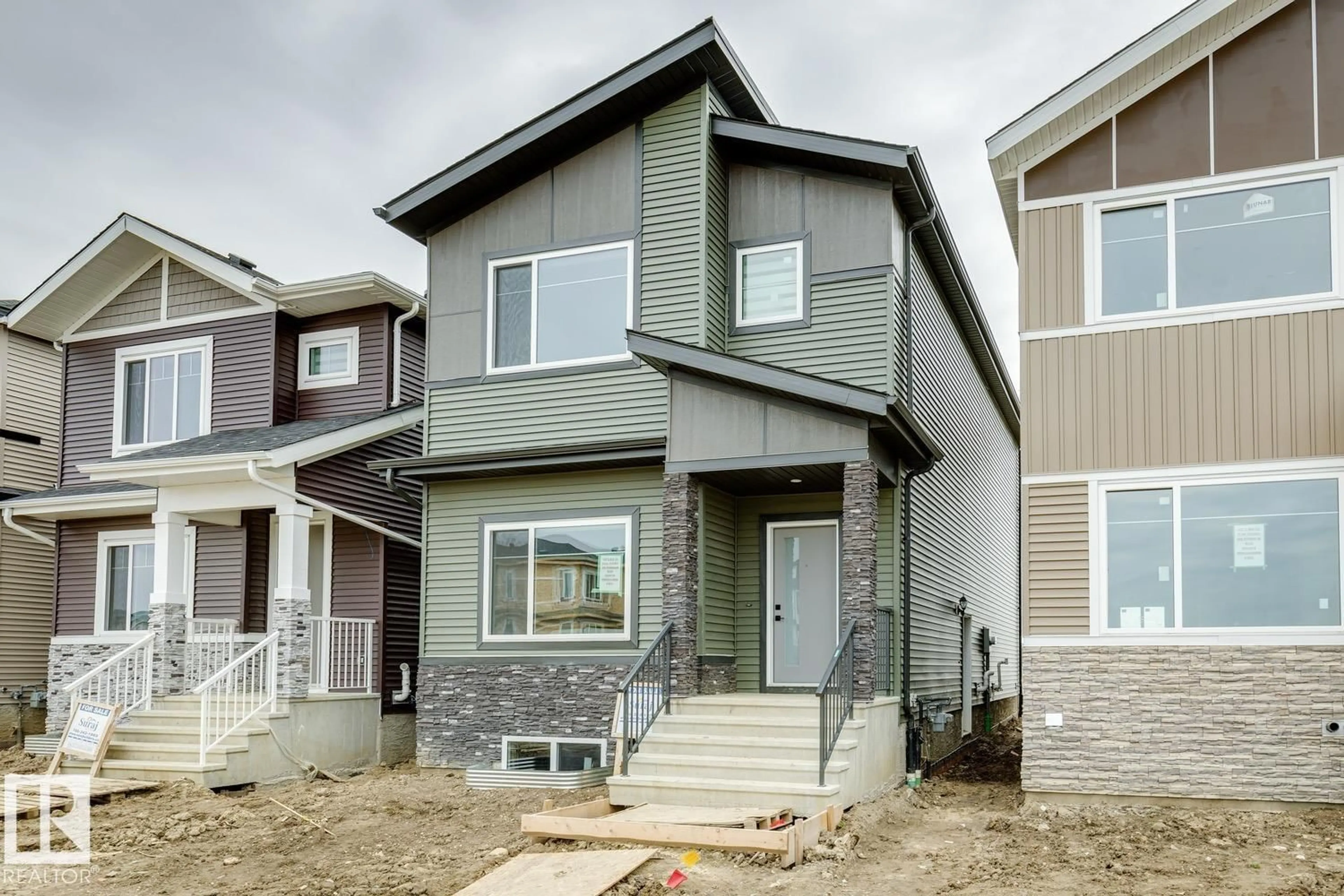 Home with vinyl exterior material, street for 490 ROBINSON BV, Leduc Alberta T9E1N1