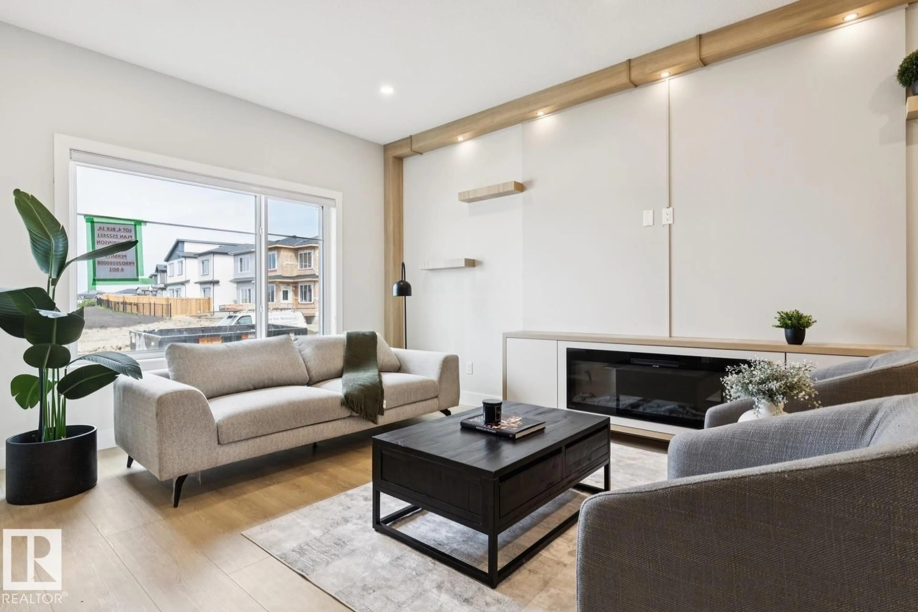 Living room with furniture, wood/laminate floor for 490 ROBINSON BV, Leduc Alberta T9E1N1
