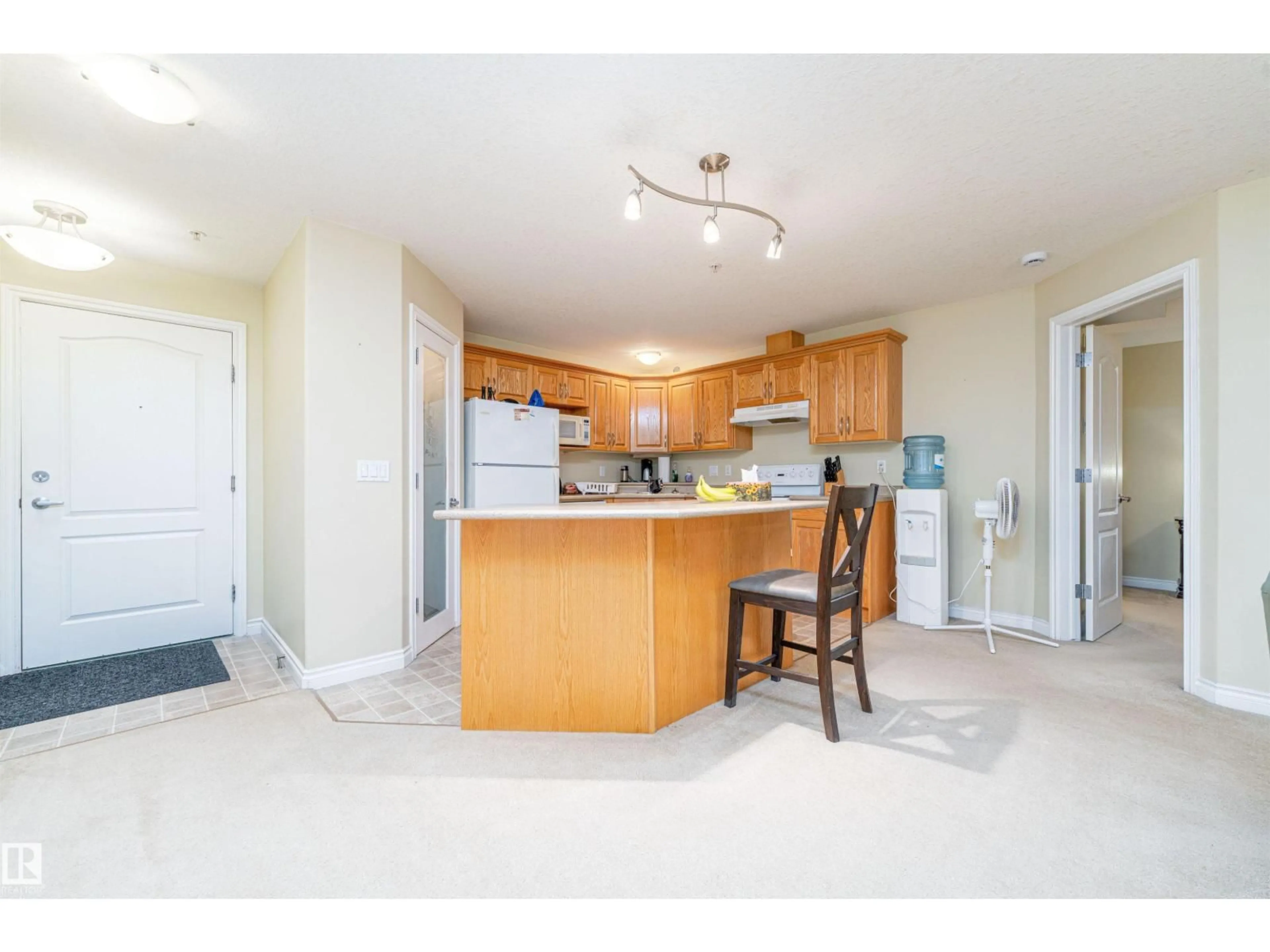 Open concept kitchen, unknown for 211 - 9995 93 AV, Fort Saskatchewan Alberta T8L1N5