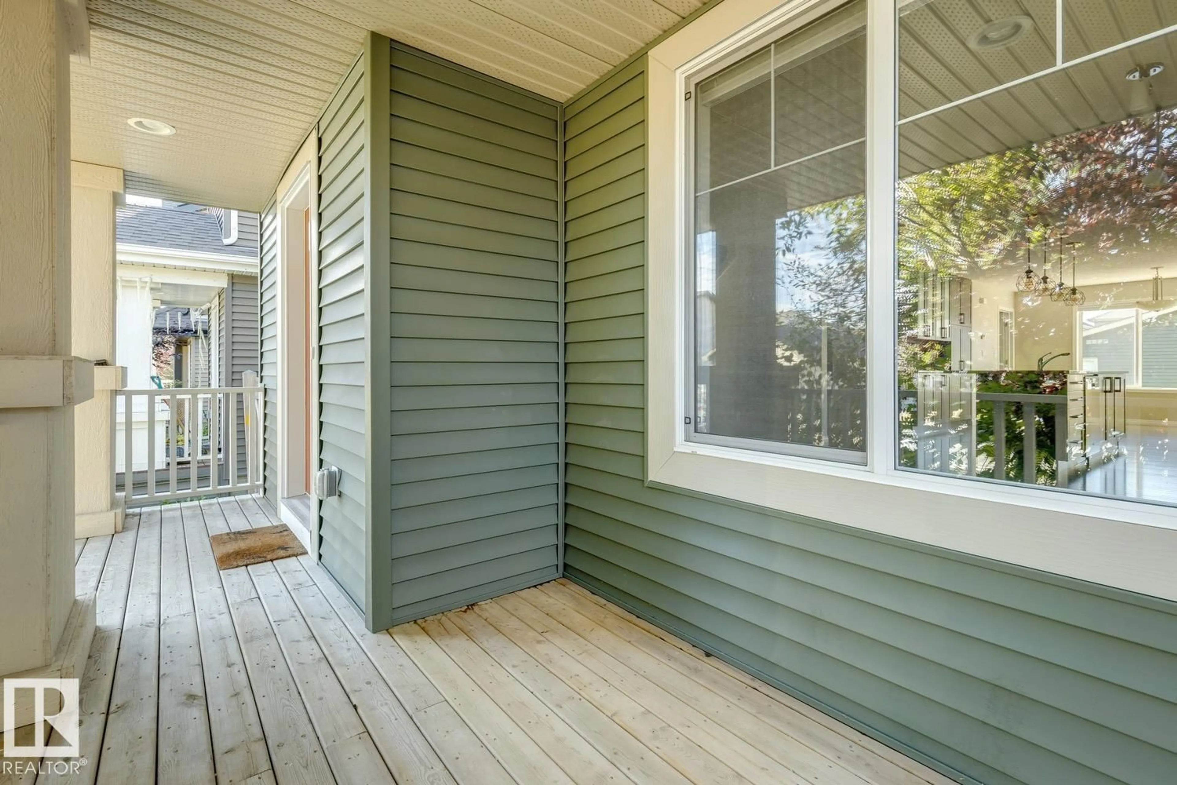 Home with vinyl exterior material, street for 8311 ELLIS CR, Edmonton Alberta T6M0P8