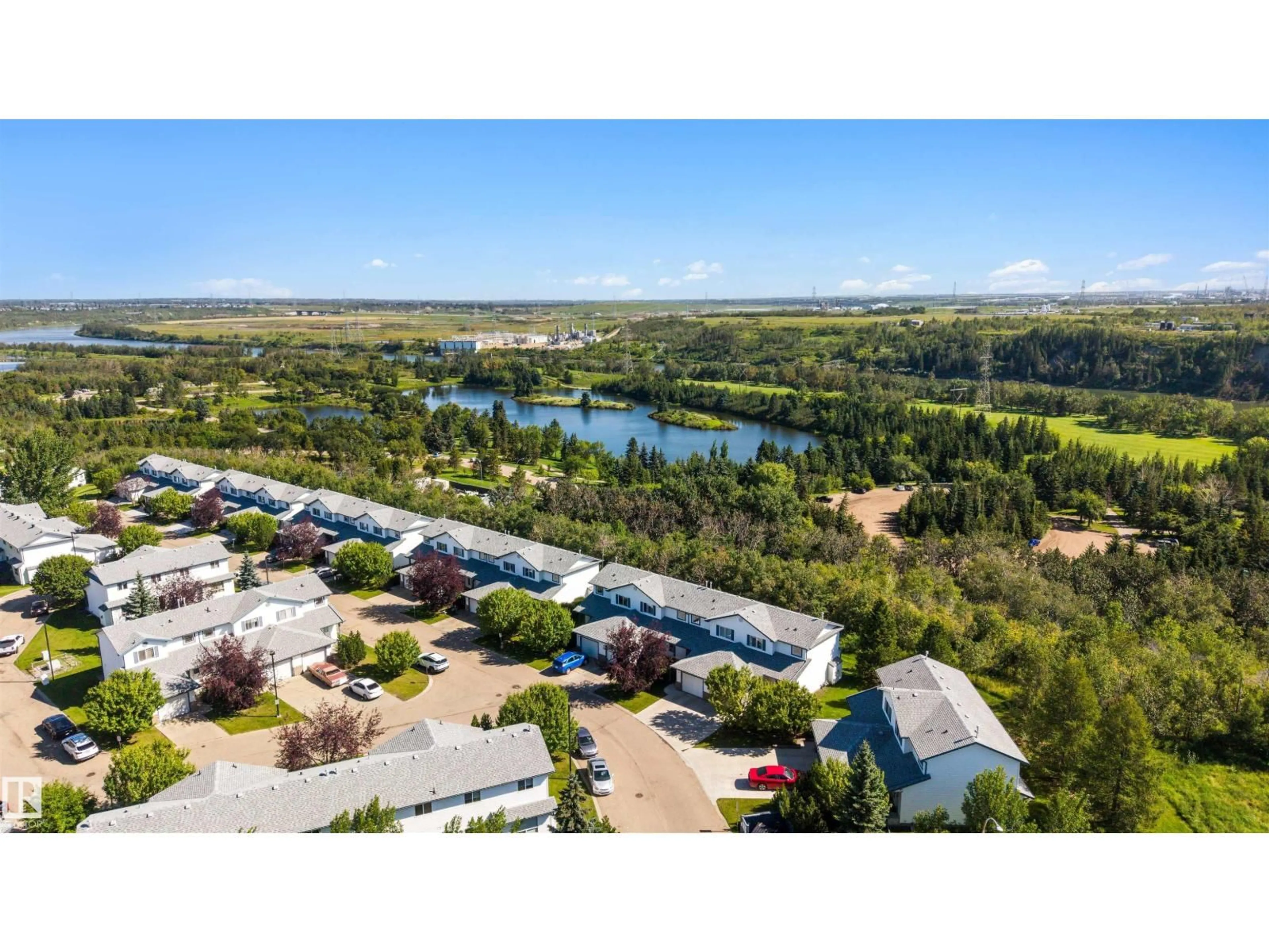 A pic from outside/outdoor area/front of a property/back of a property/a pic from drone, water/lake/river/ocean view for #3 - 450 HYNDMAN CR, Edmonton Alberta T5A0E2