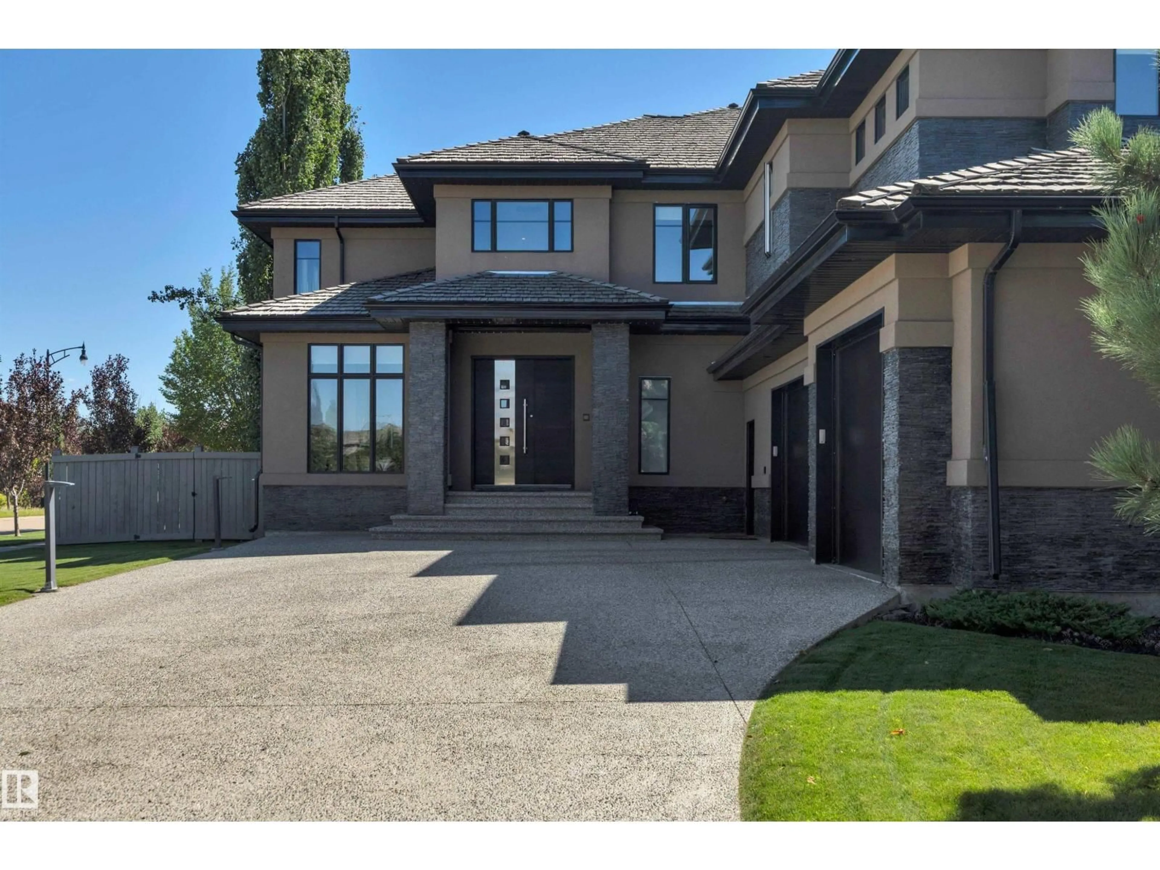 Home with brick exterior material, street for 5047 MCLUHAN RD, Edmonton Alberta T6R0J4