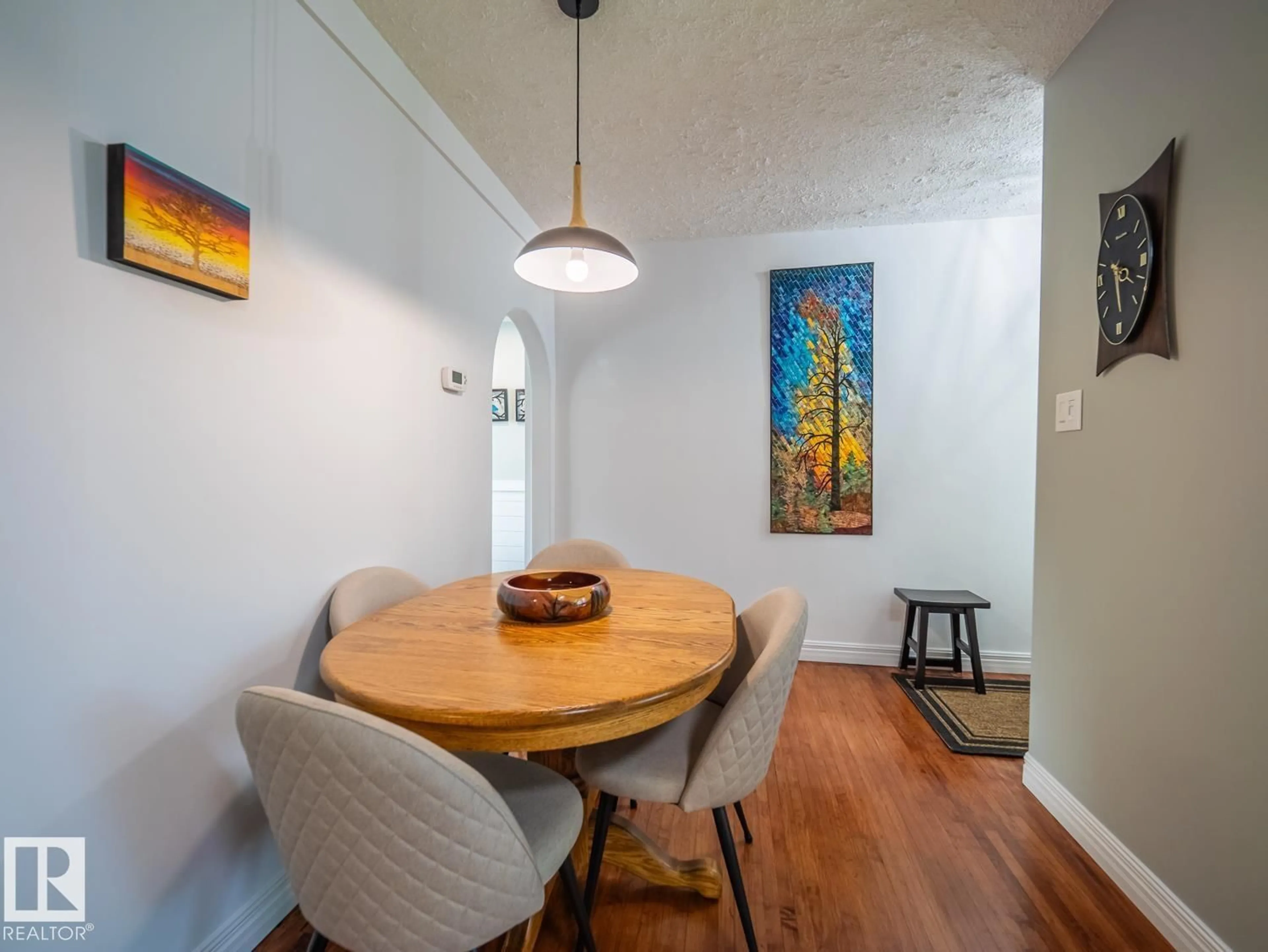Dining room, wood/laminate floor for 10511 68 AV, Edmonton Alberta T6H2B2