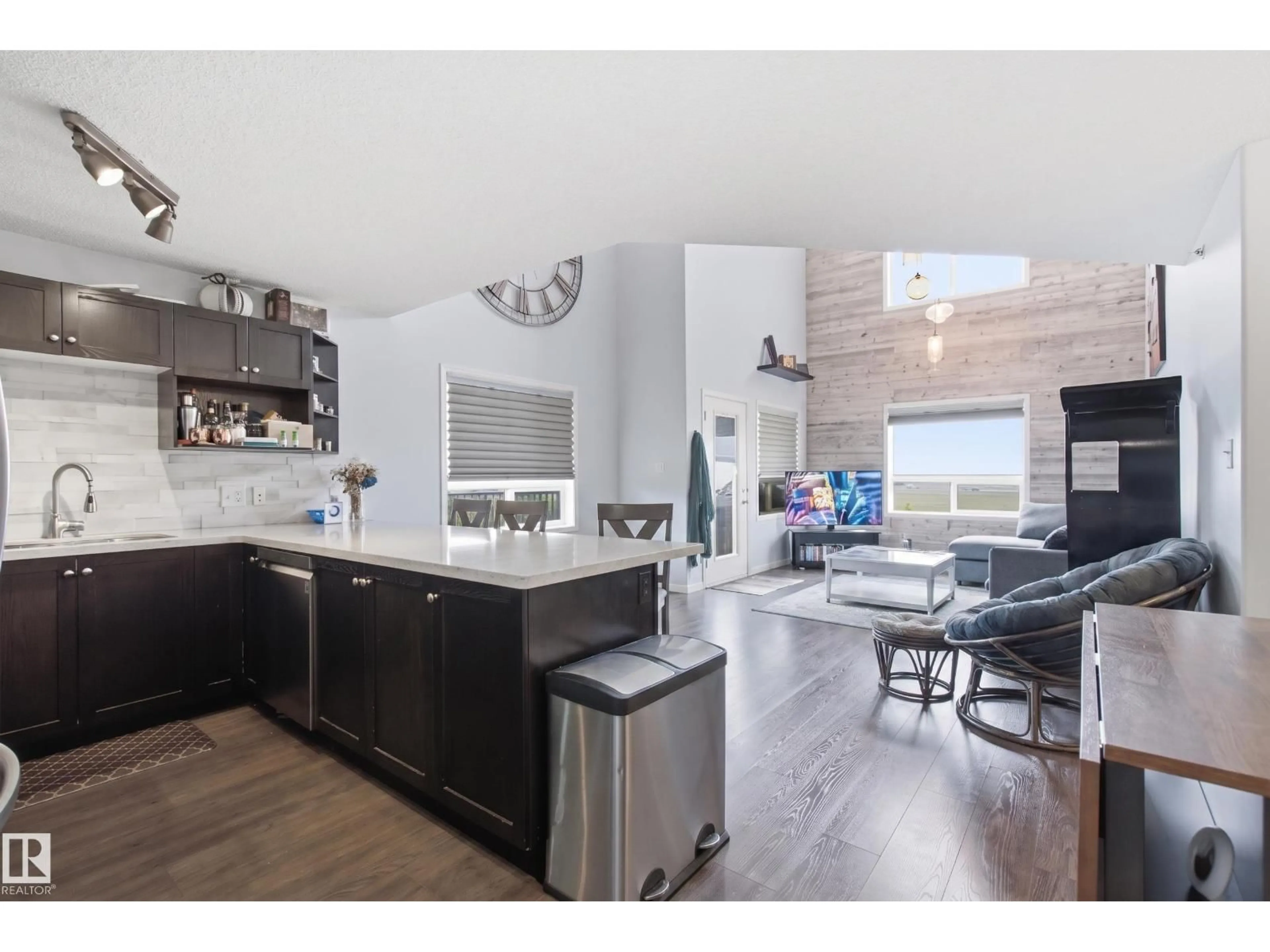 Open concept kitchen, wood/laminate floor for 9357 - 2415 SIMPOSON DR, Edmonton Alberta T6R0N3