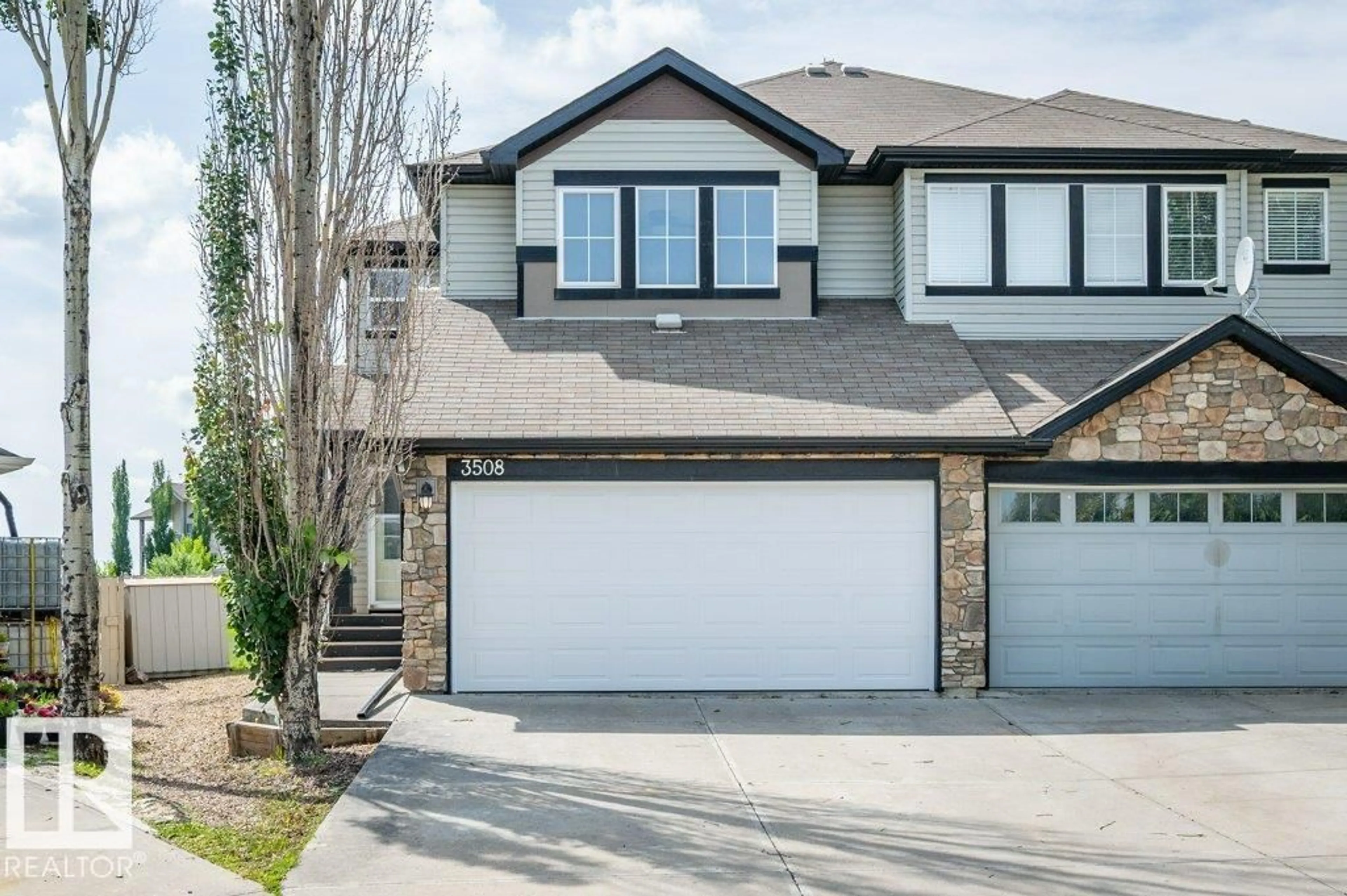 Home with vinyl exterior material, street for 3508 16 ST, Edmonton Alberta T6T0M6