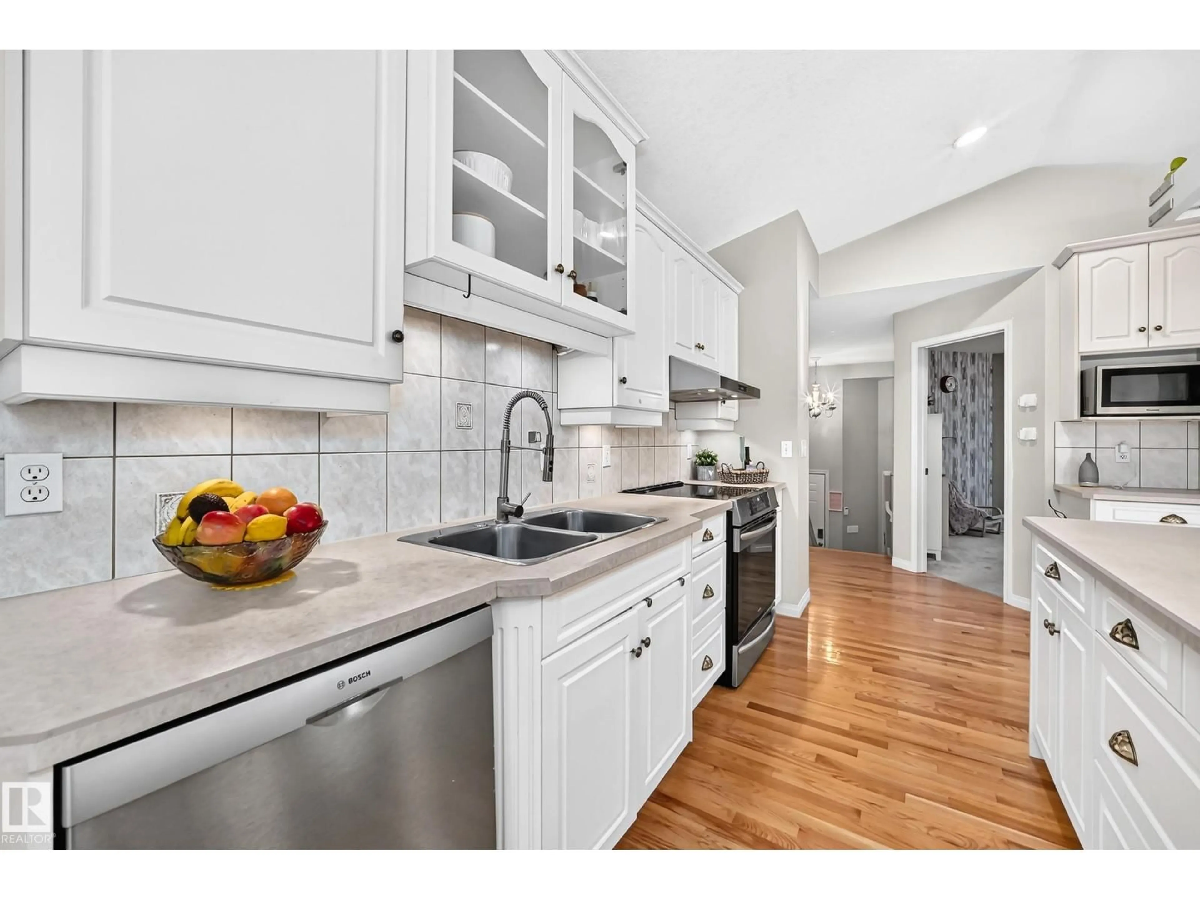 Open concept kitchen, ceramic/tile floor for 4210 37 AV, Edmonton Alberta T6L7C3