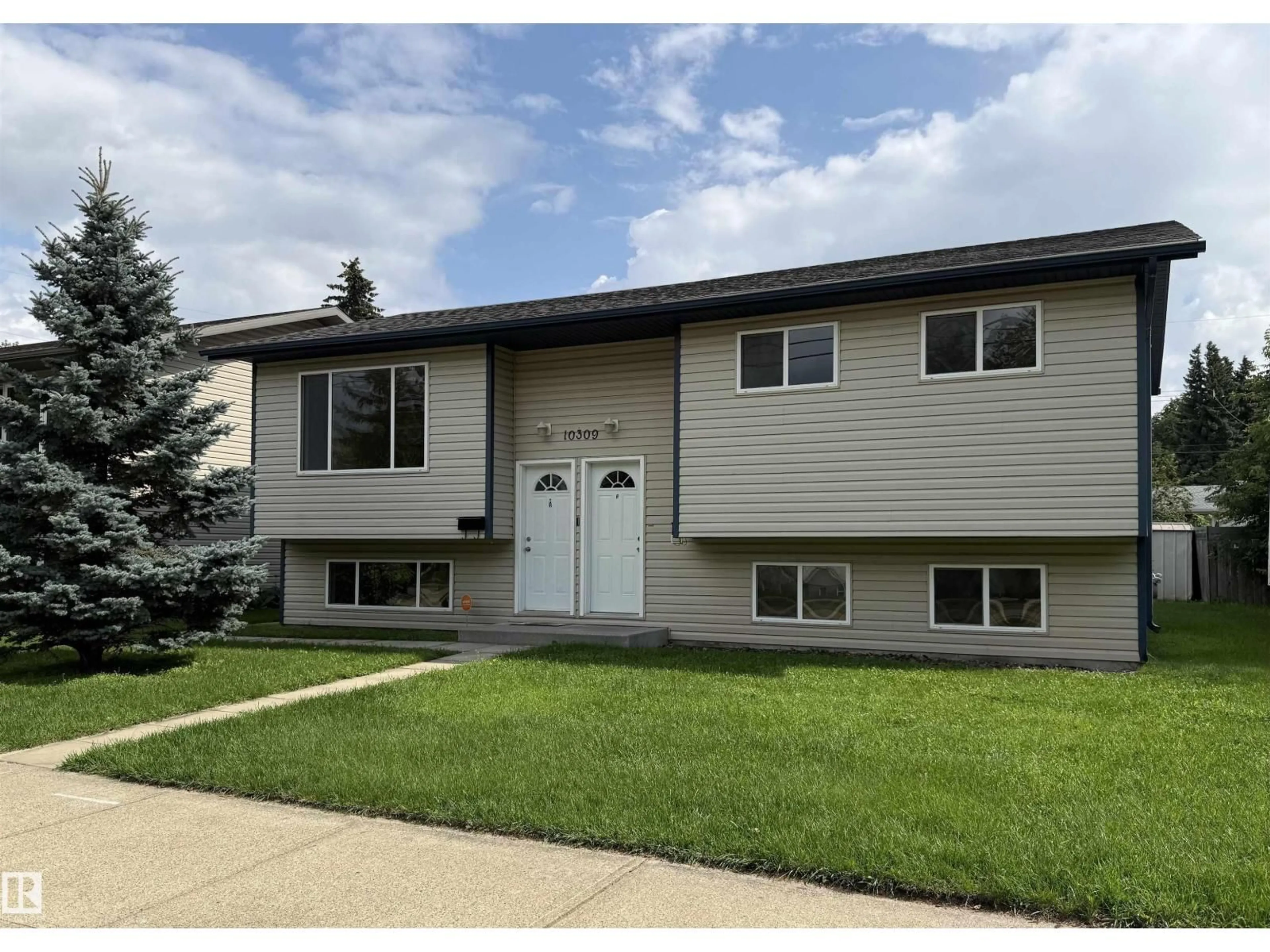 Home with vinyl exterior material, street for 10309A & 10309B 98 AV, Fort Saskatchewan Alberta T8L2N6