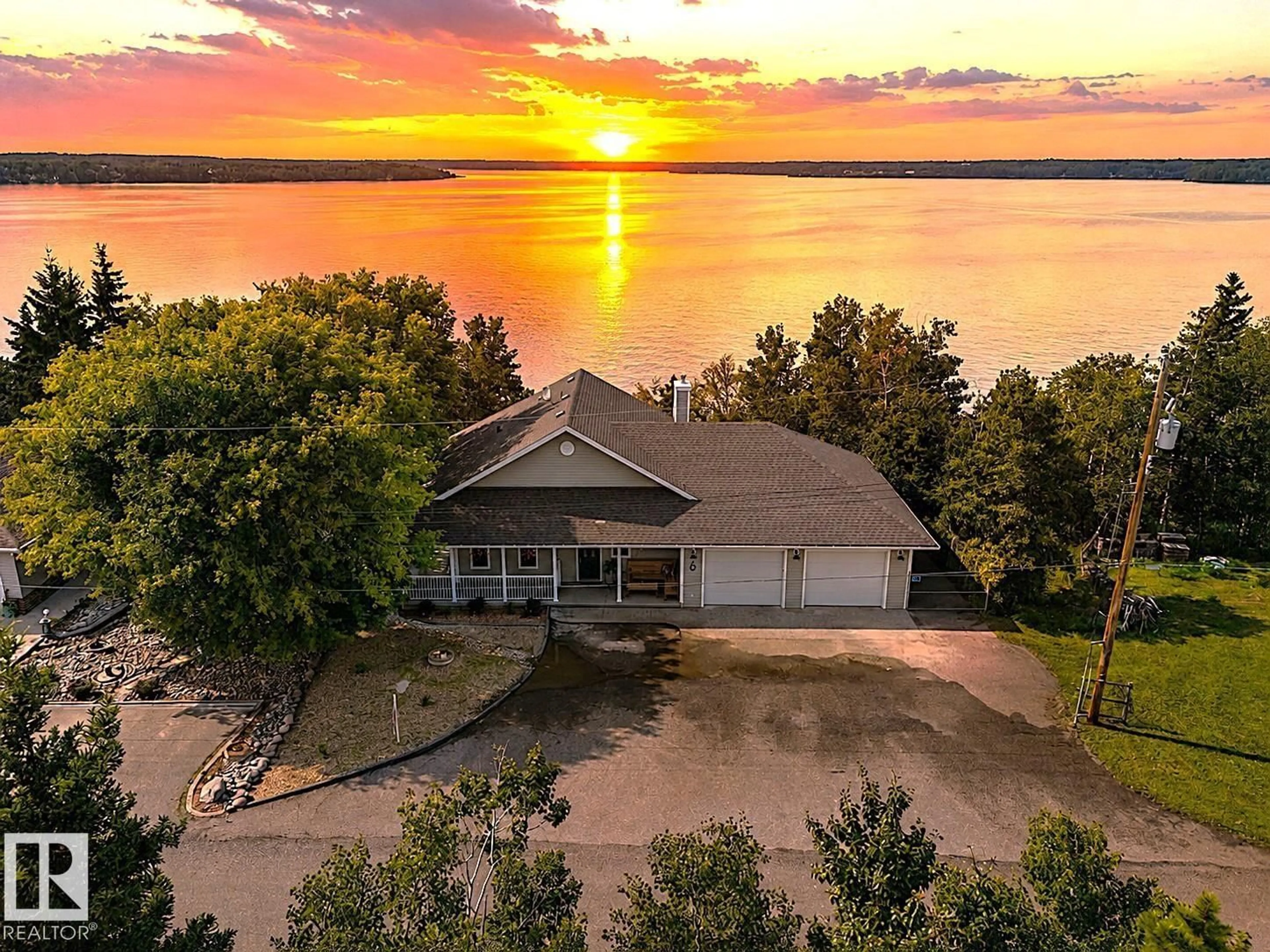 A pic from outside/outdoor area/front of a property/back of a property/a pic from drone, water/lake/river/ocean view for 6 - 61212 RANGE ROAD 463, Rural Bonnyville M.D. Alberta T9N2G9