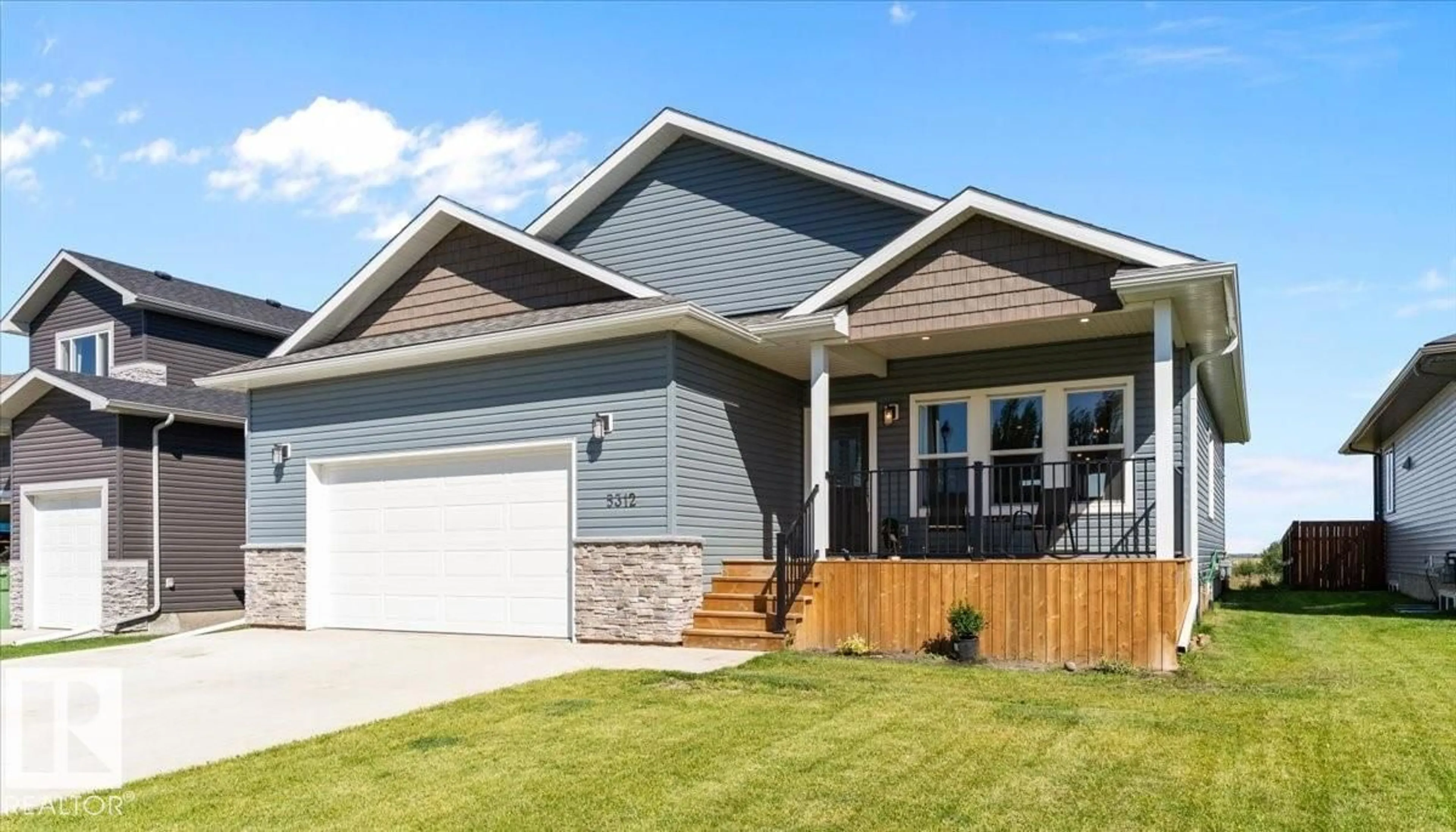 Home with vinyl exterior material, street for 5312 55 AV, Tofield Alberta T0B4J0