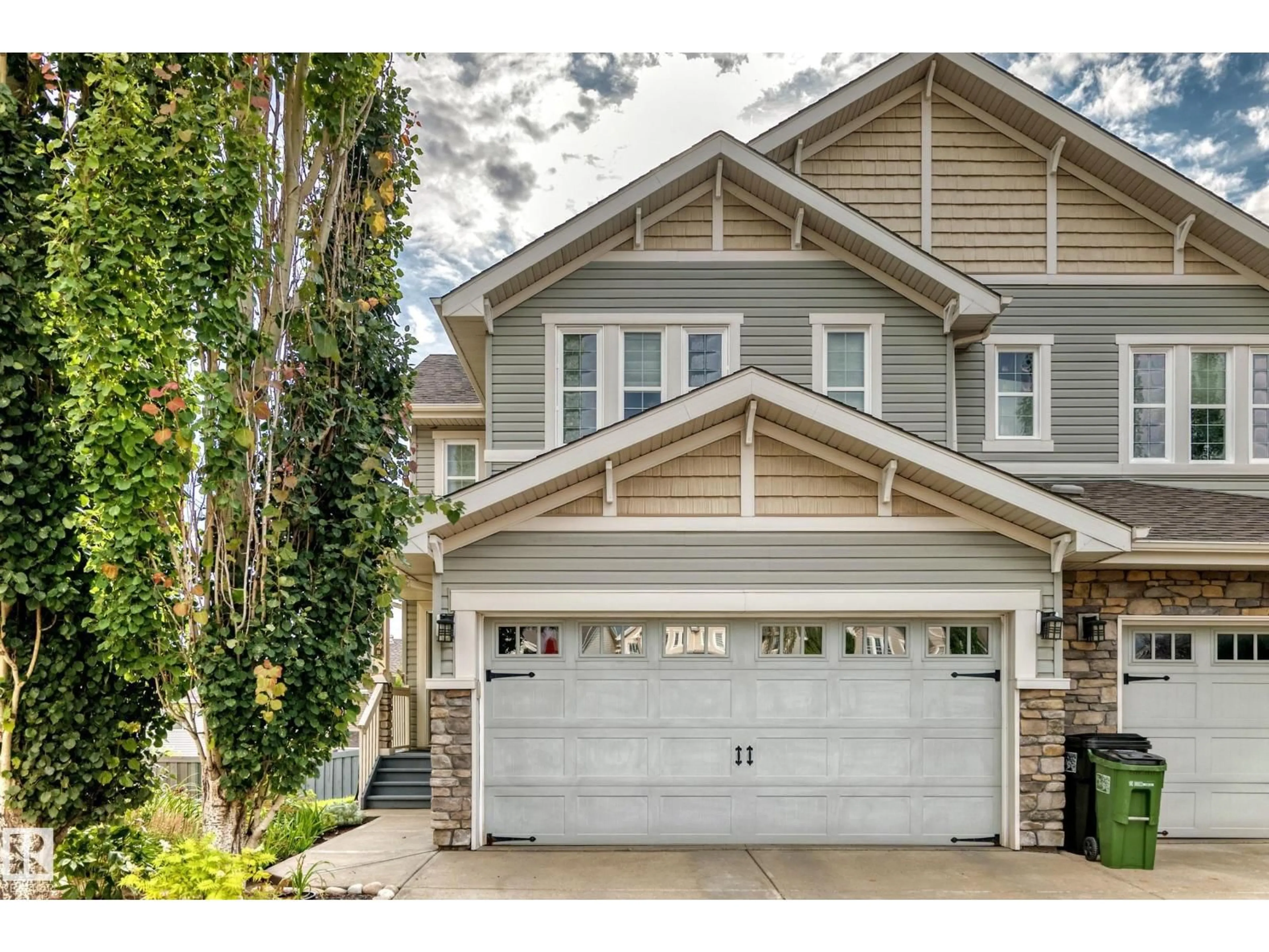 Home with vinyl exterior material, street for NW - 4904 214 ST, Edmonton Alberta T6M0K6