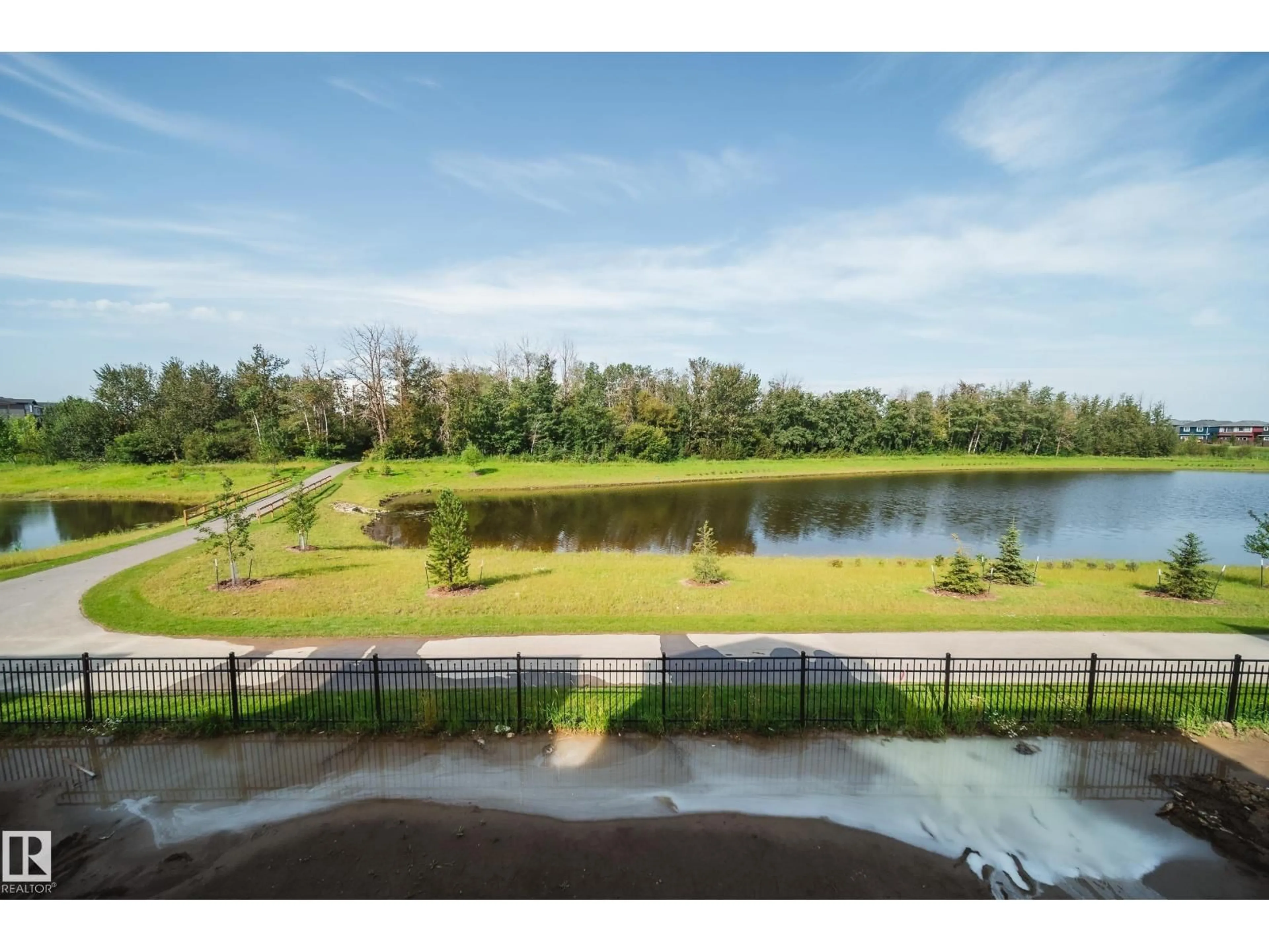 A pic from outside/outdoor area/front of a property/back of a property/a pic from drone, water/lake/river/ocean view for 49 NORWYK WAY, Spruce Grove Alberta T7X4E9